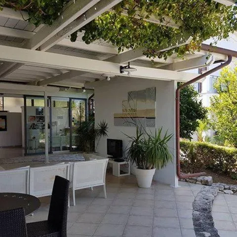 Communal lounge/ TV room in Albergo Villa Vittoria