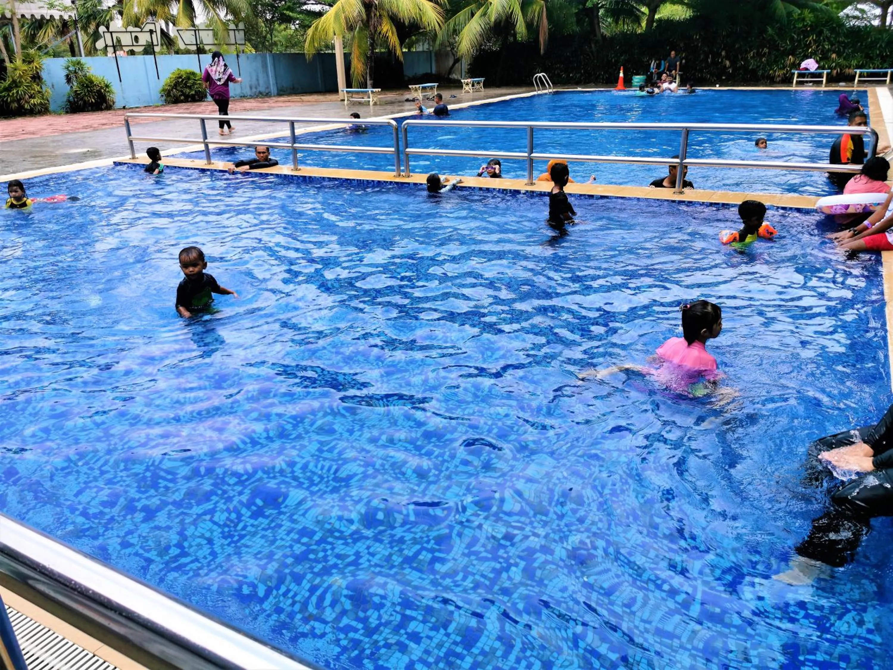 People in FHS Water Themepark Resort Melaka Town City Tengah