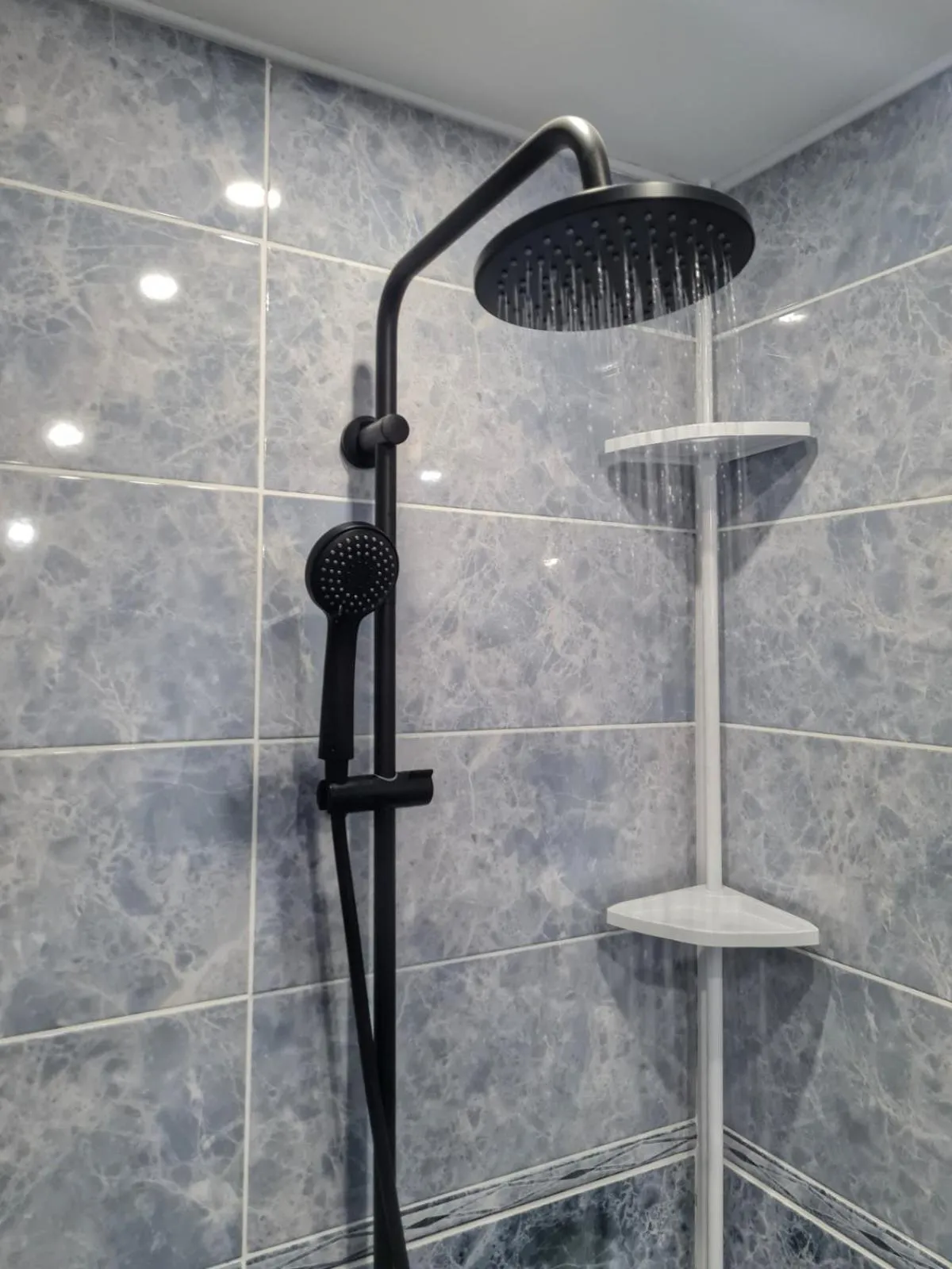 Shower in apartman Goga with pool and jacuzzi
