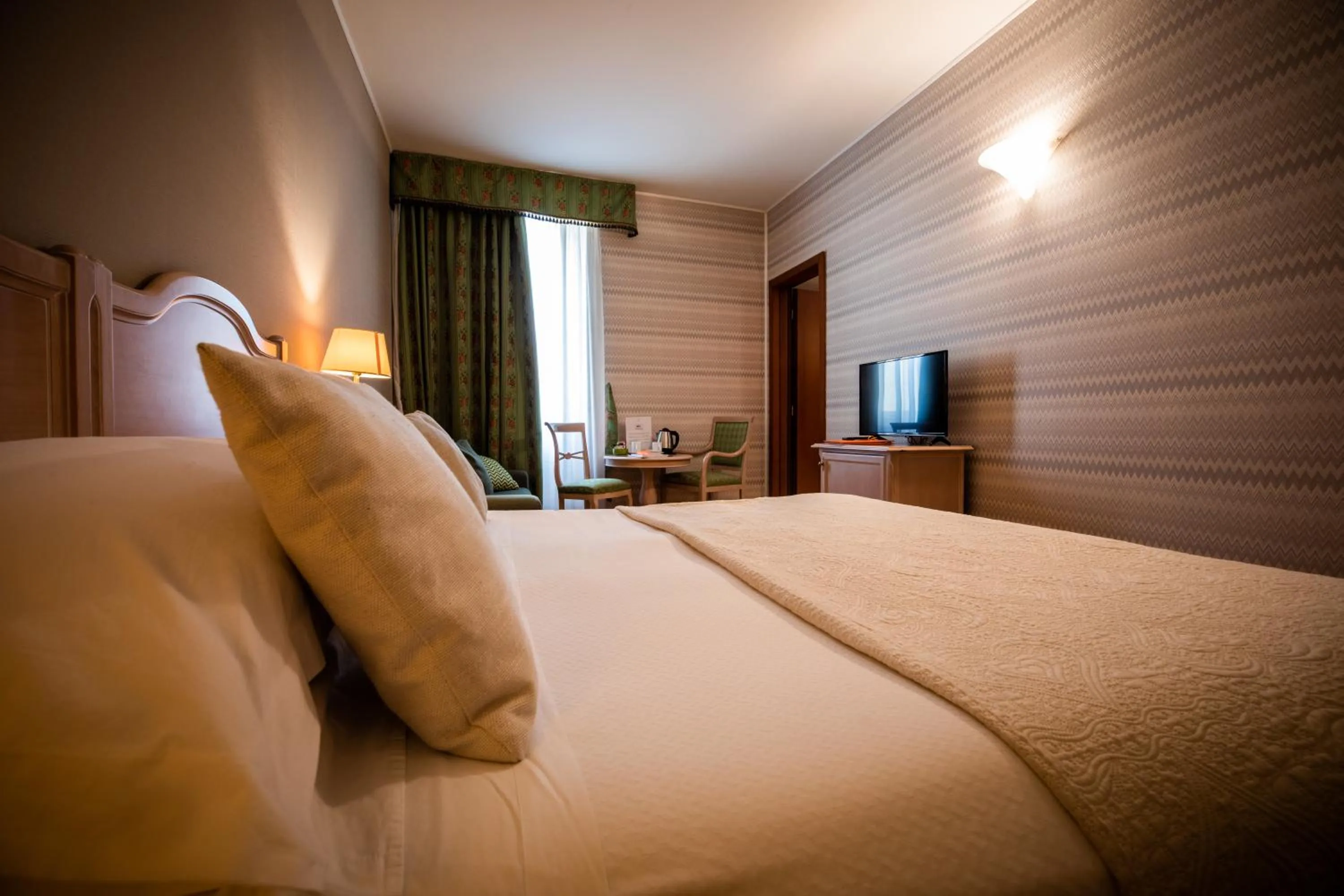 Bed in Hotel Palazzo Lovera