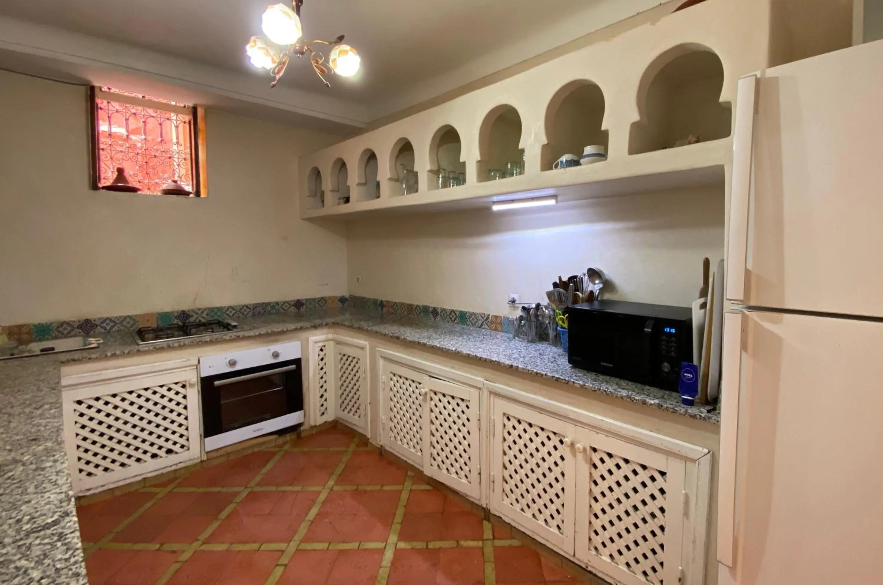 Communal kitchen in Riad Of The Storks