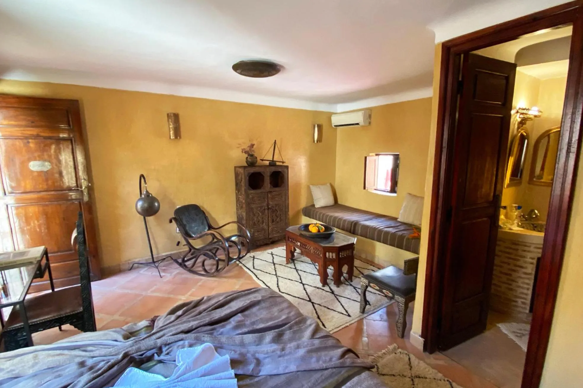 Seating area, Bed in Riad Of The Storks
