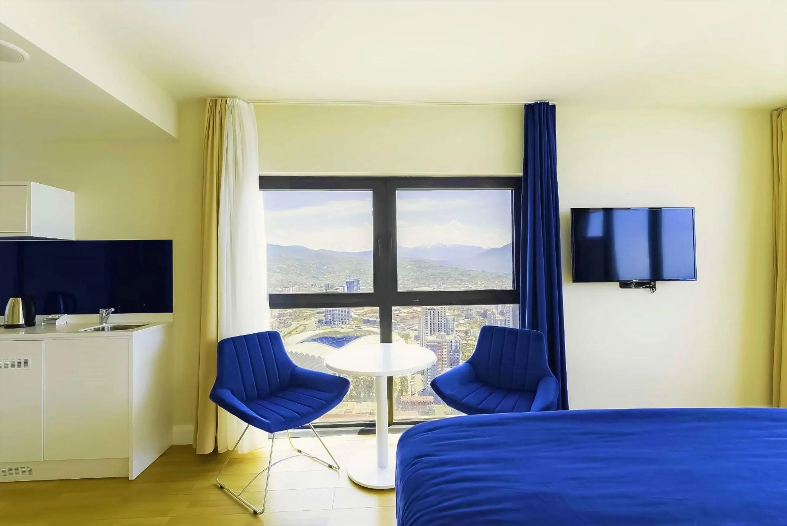 Bed in Orbi City Hotel With Sea View