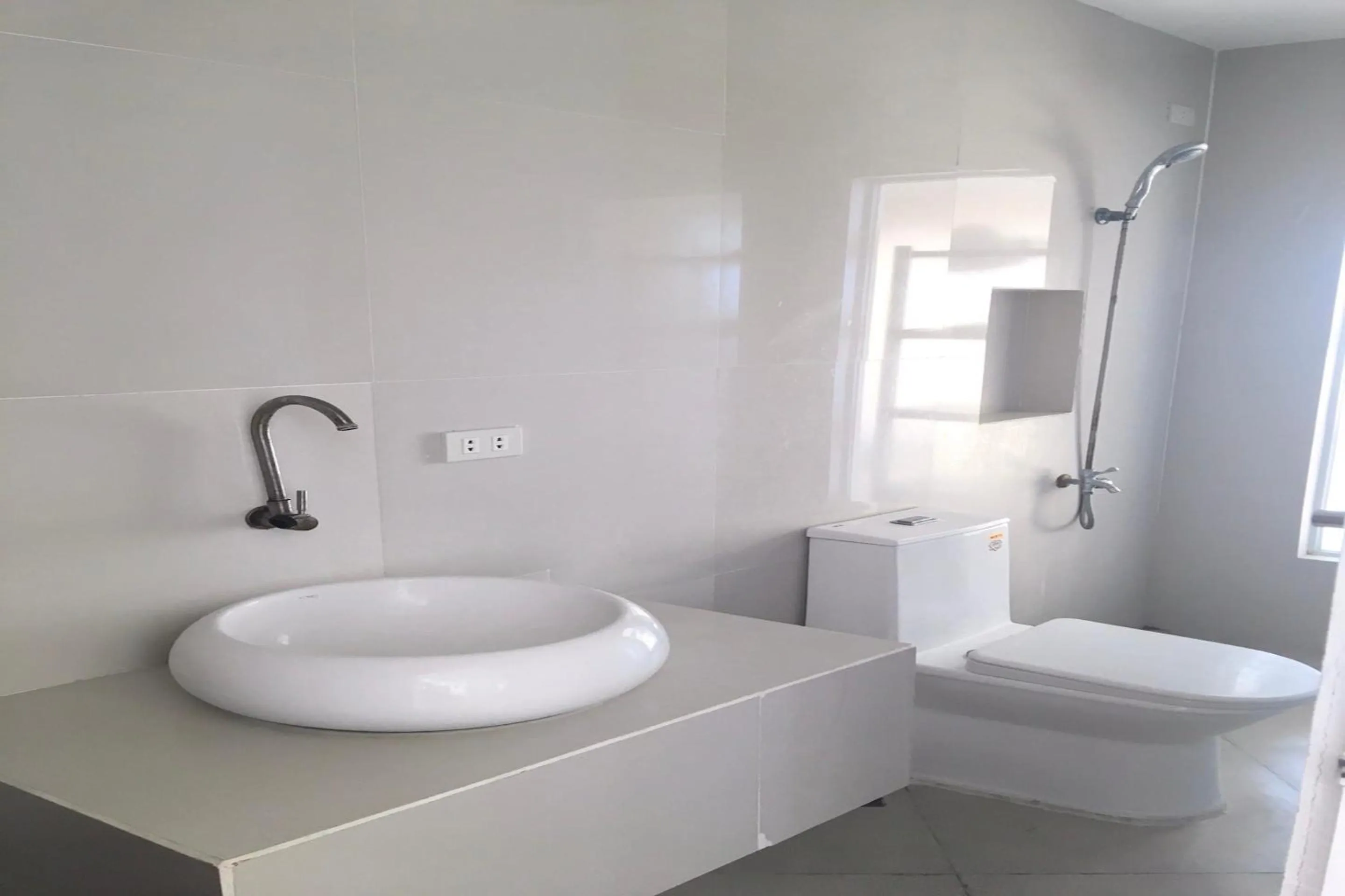 Bathroom in OYO 921 Sorrento Hotel And Resort