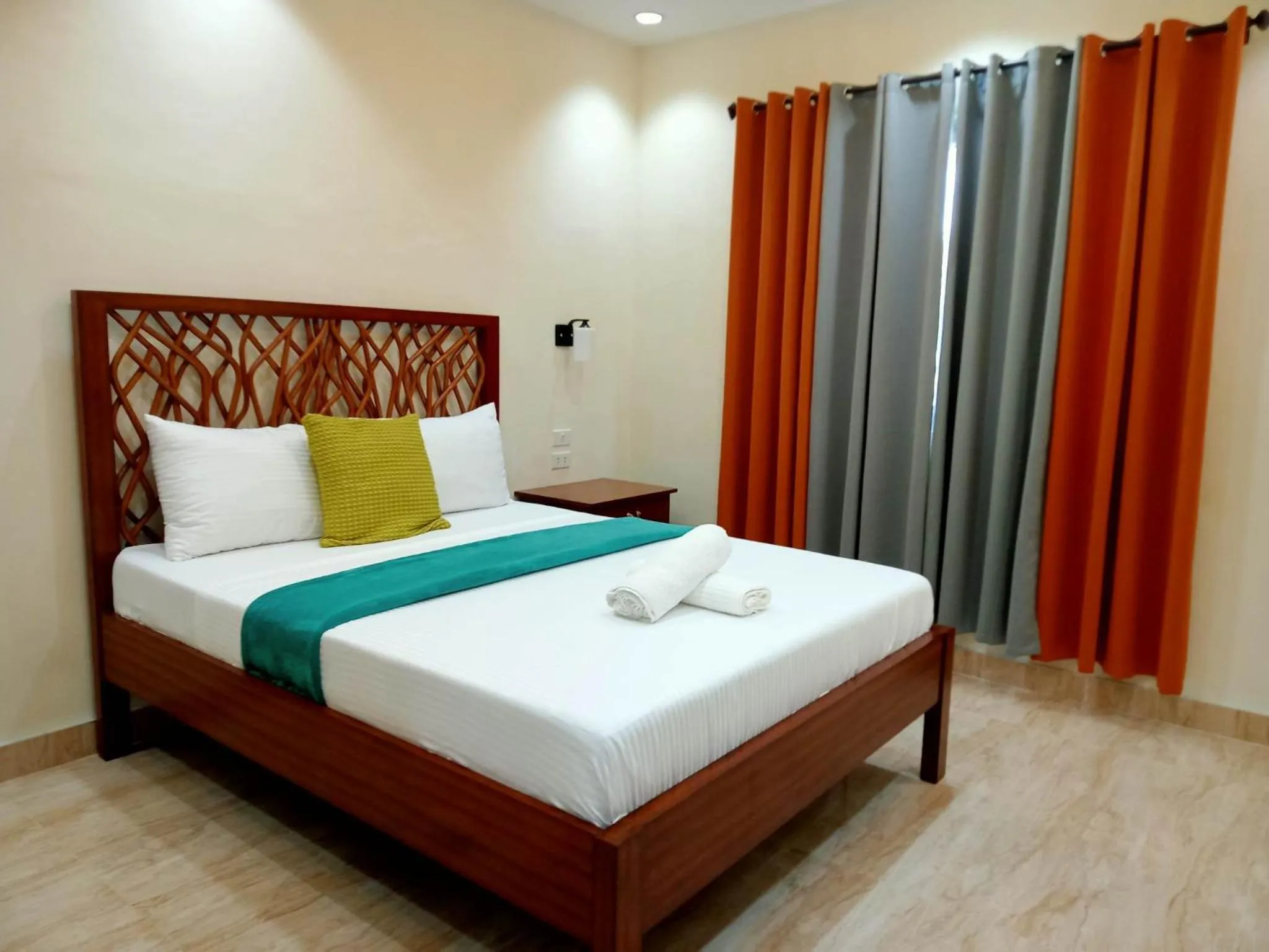 Bed in PMG Islandscape Resort