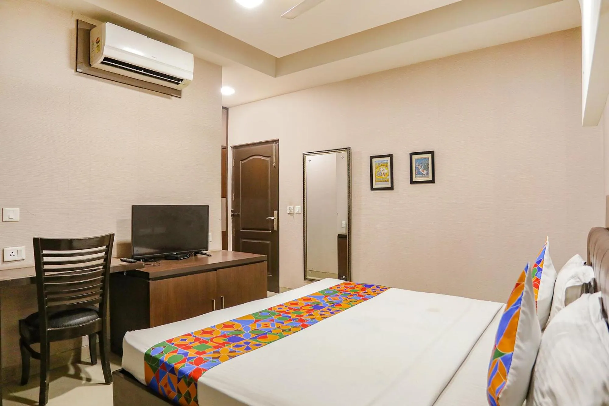 Bed in FabHotel Grand Olive