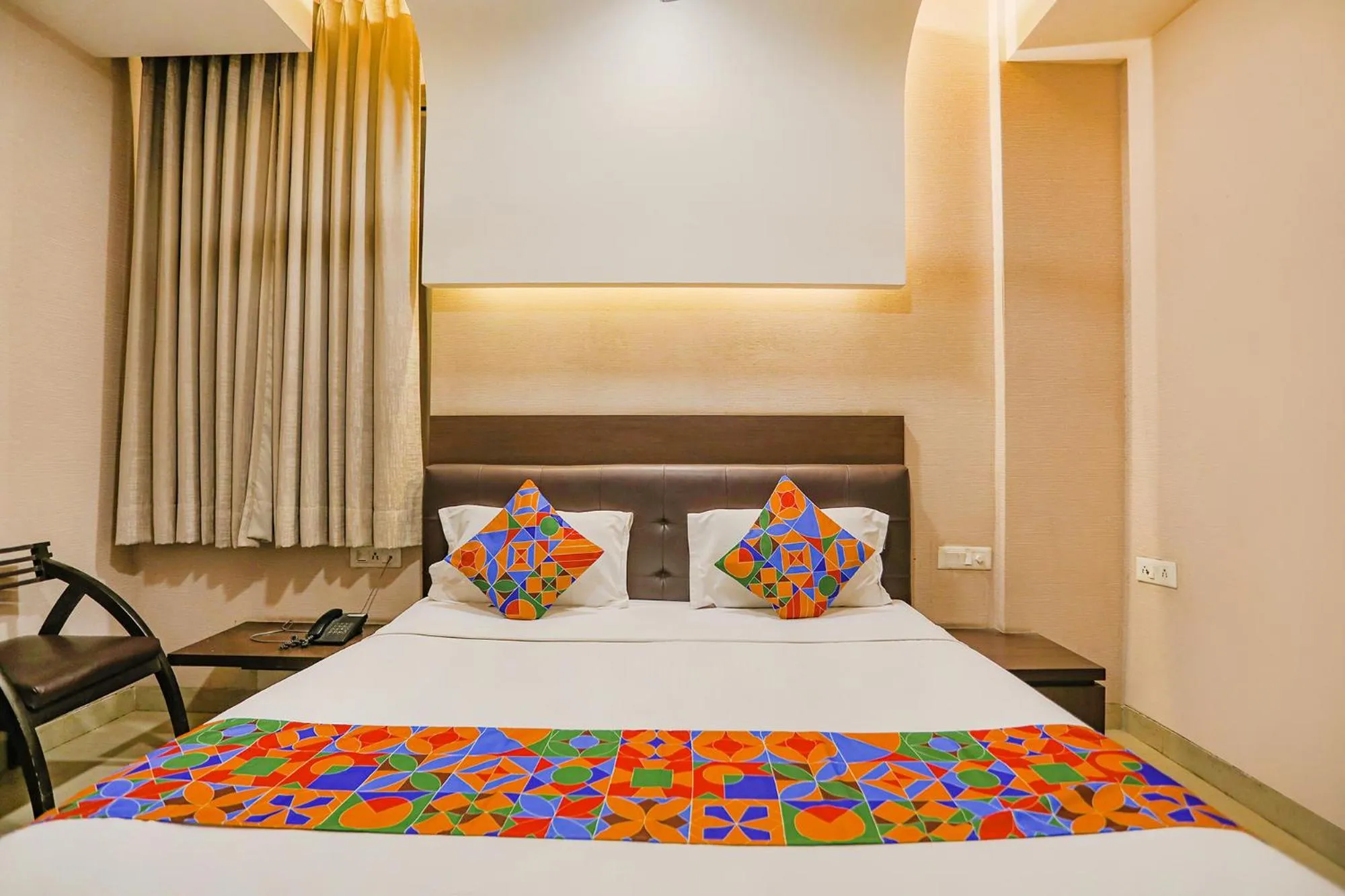 Bed in FabHotel Grand Olive