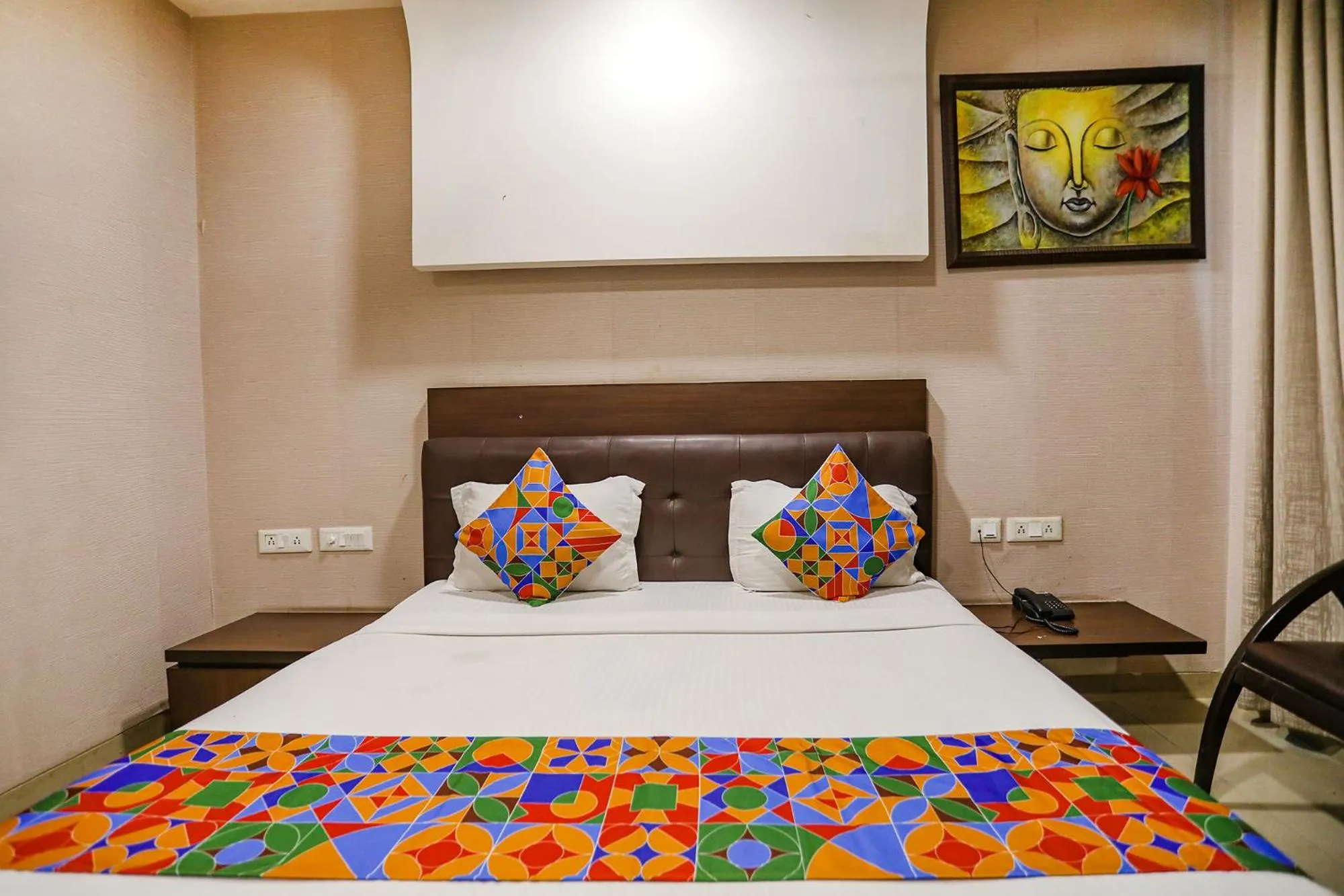 Bed in FabHotel Grand Olive