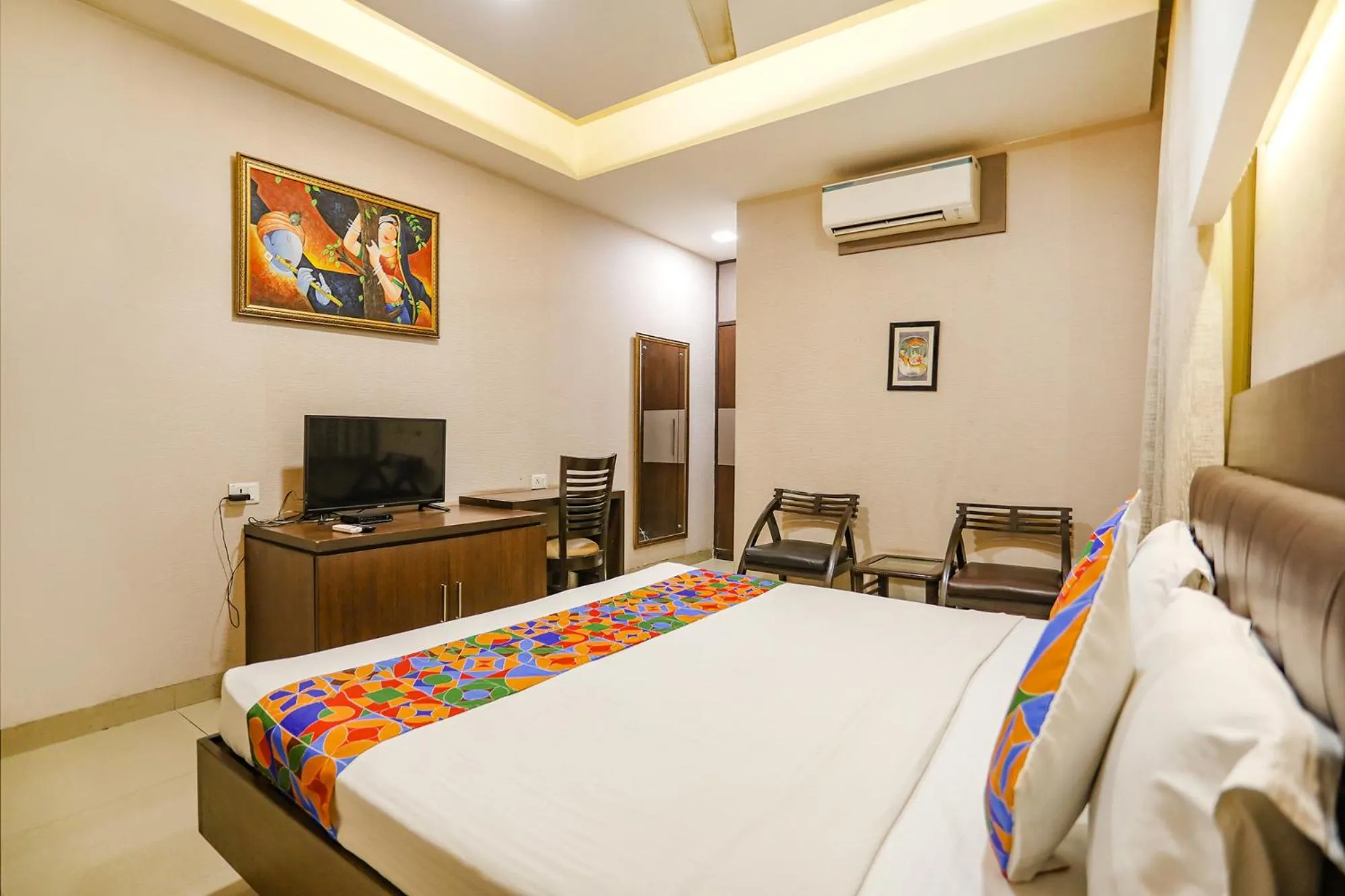 Bed in FabHotel Grand Olive