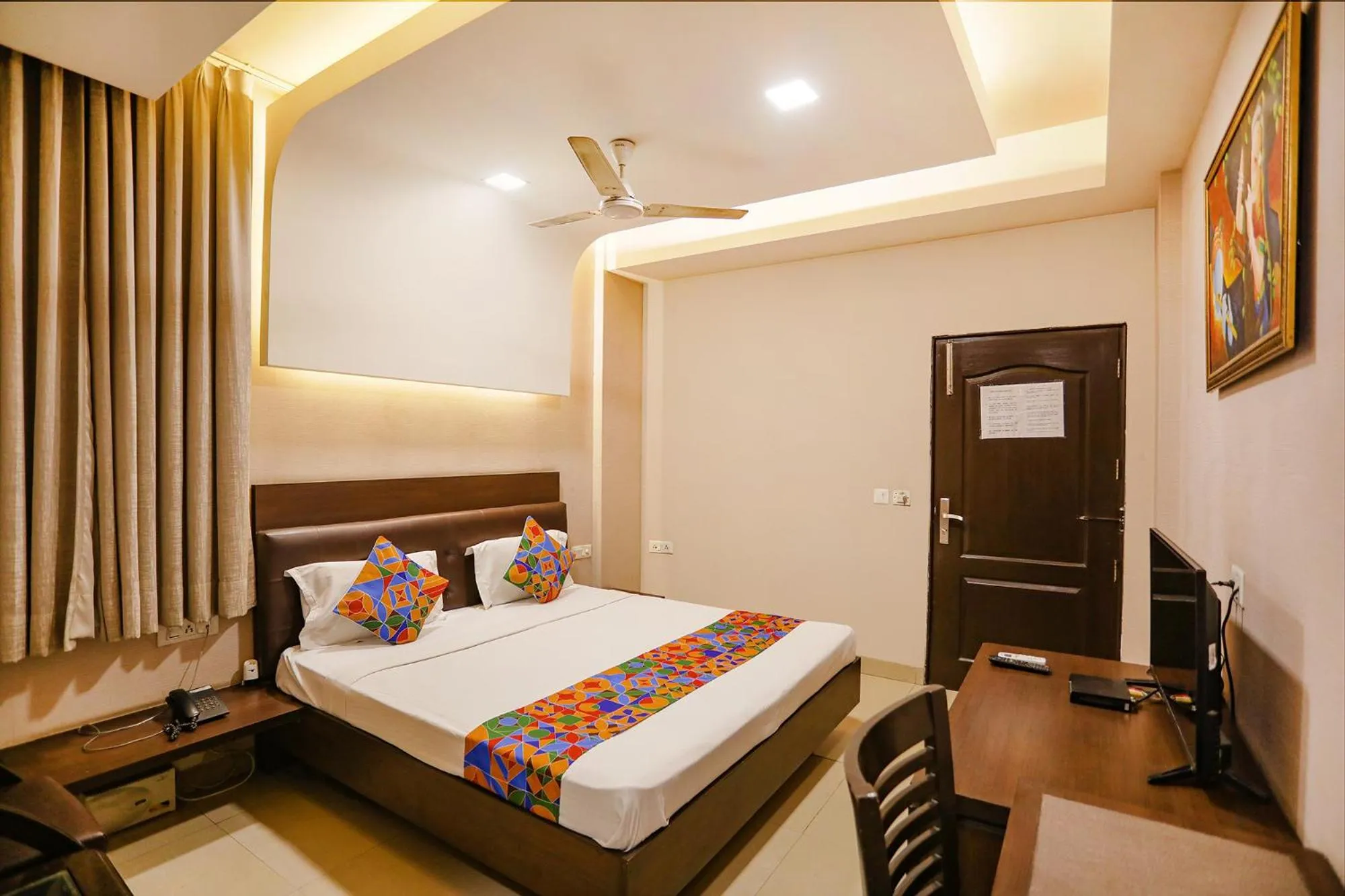 Bed in FabHotel Grand Olive