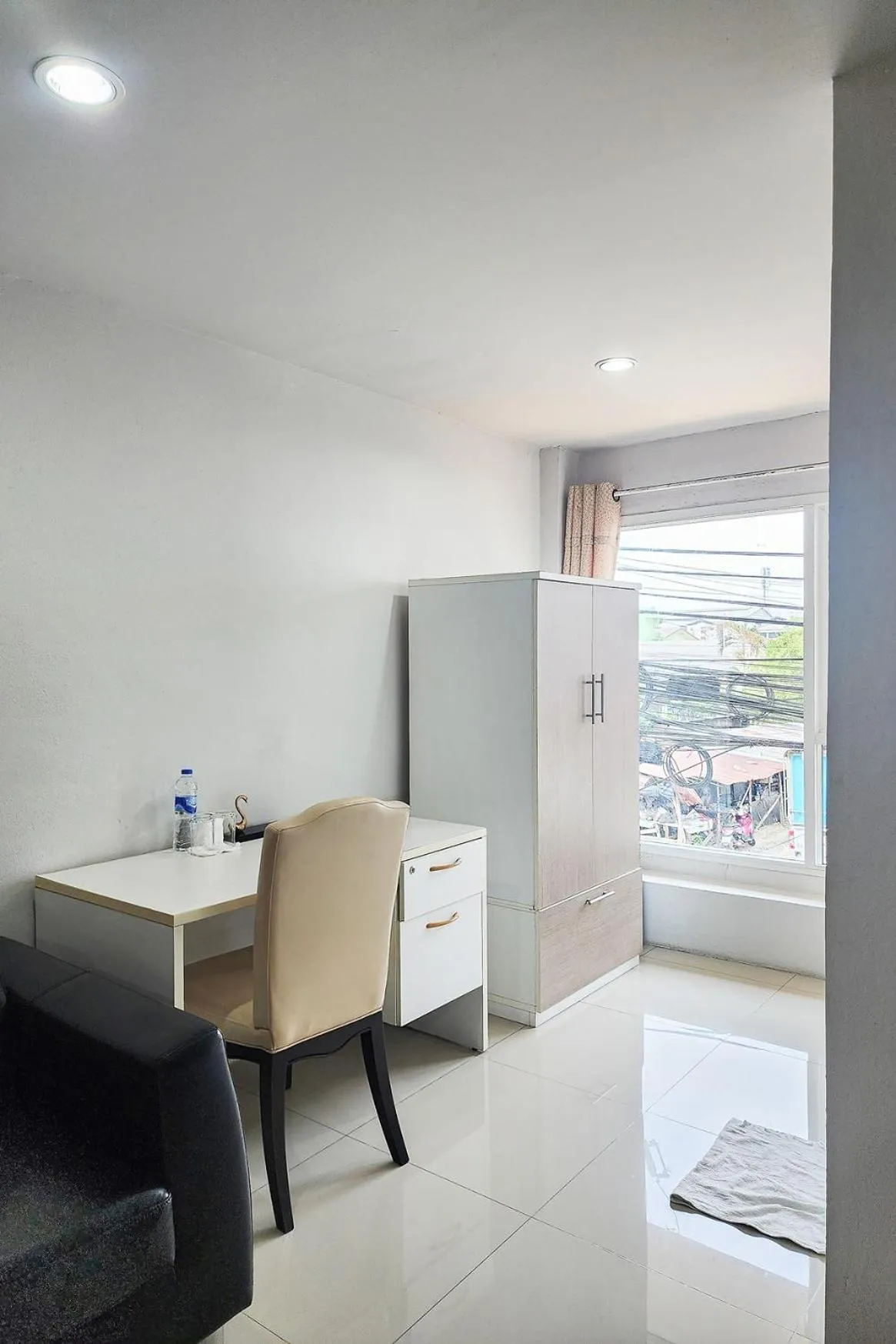 Seating area in Freesia Bangphi Guest House