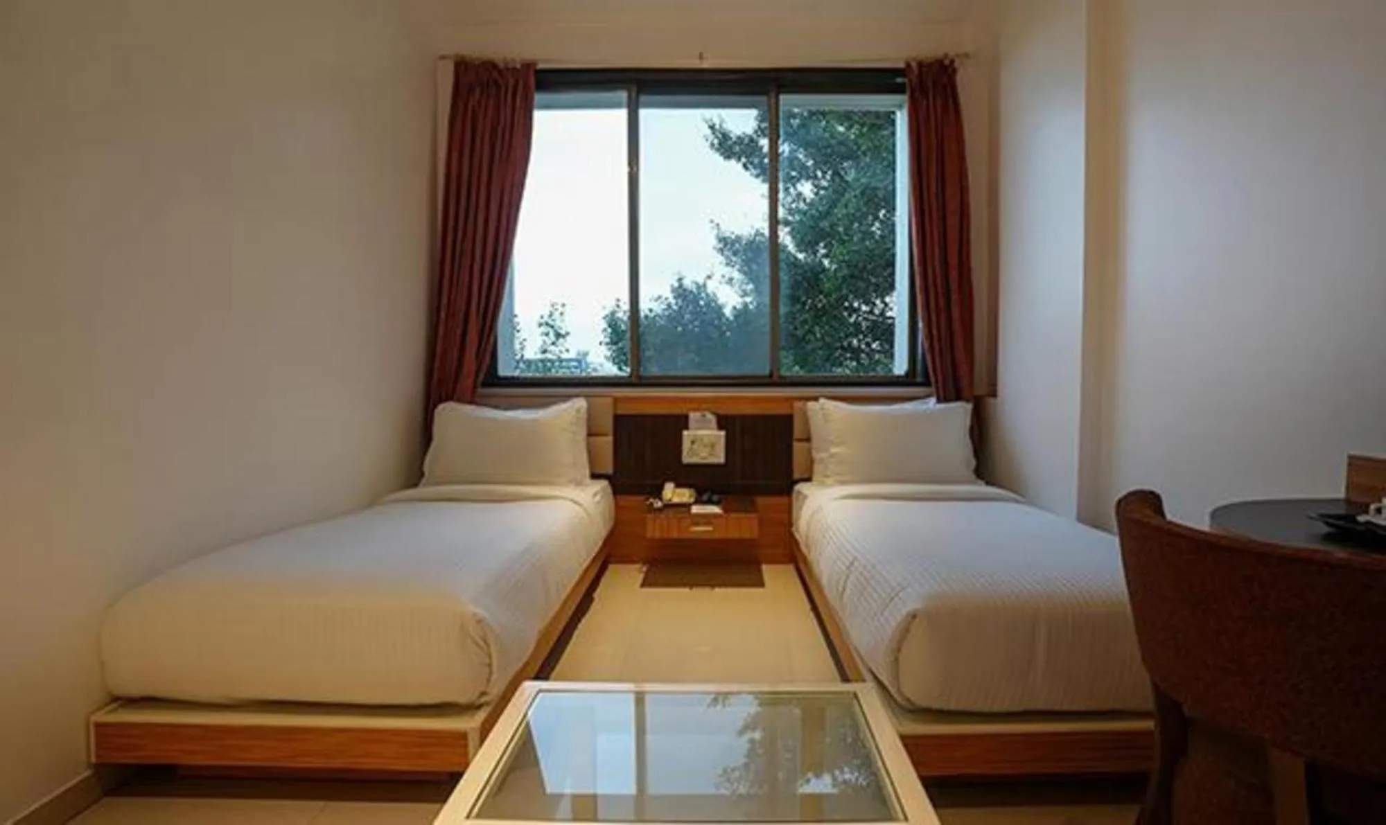 Bed in FabHotel Prime Rester Select Chakan