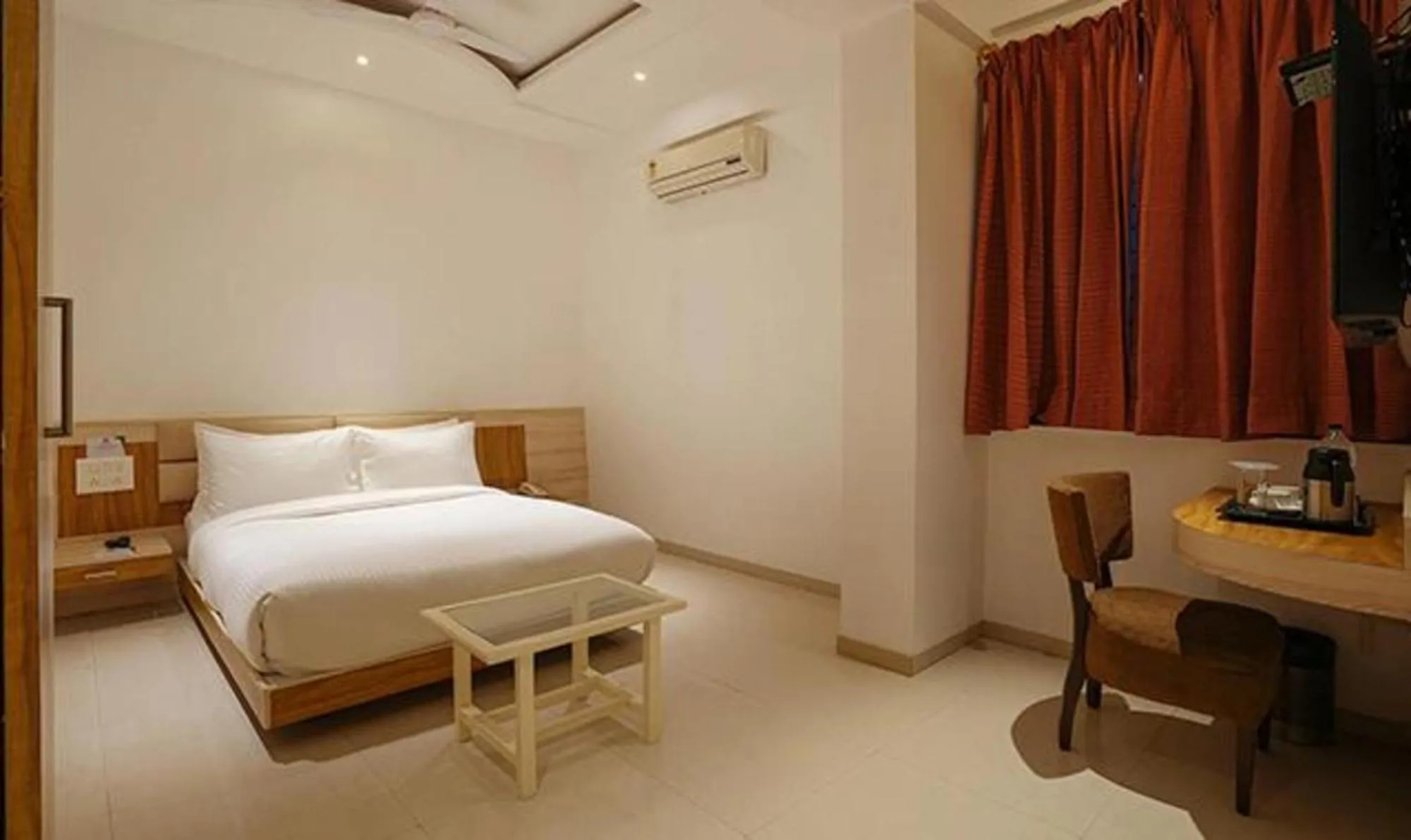 Bed in FabHotel Prime Rester Select Chakan