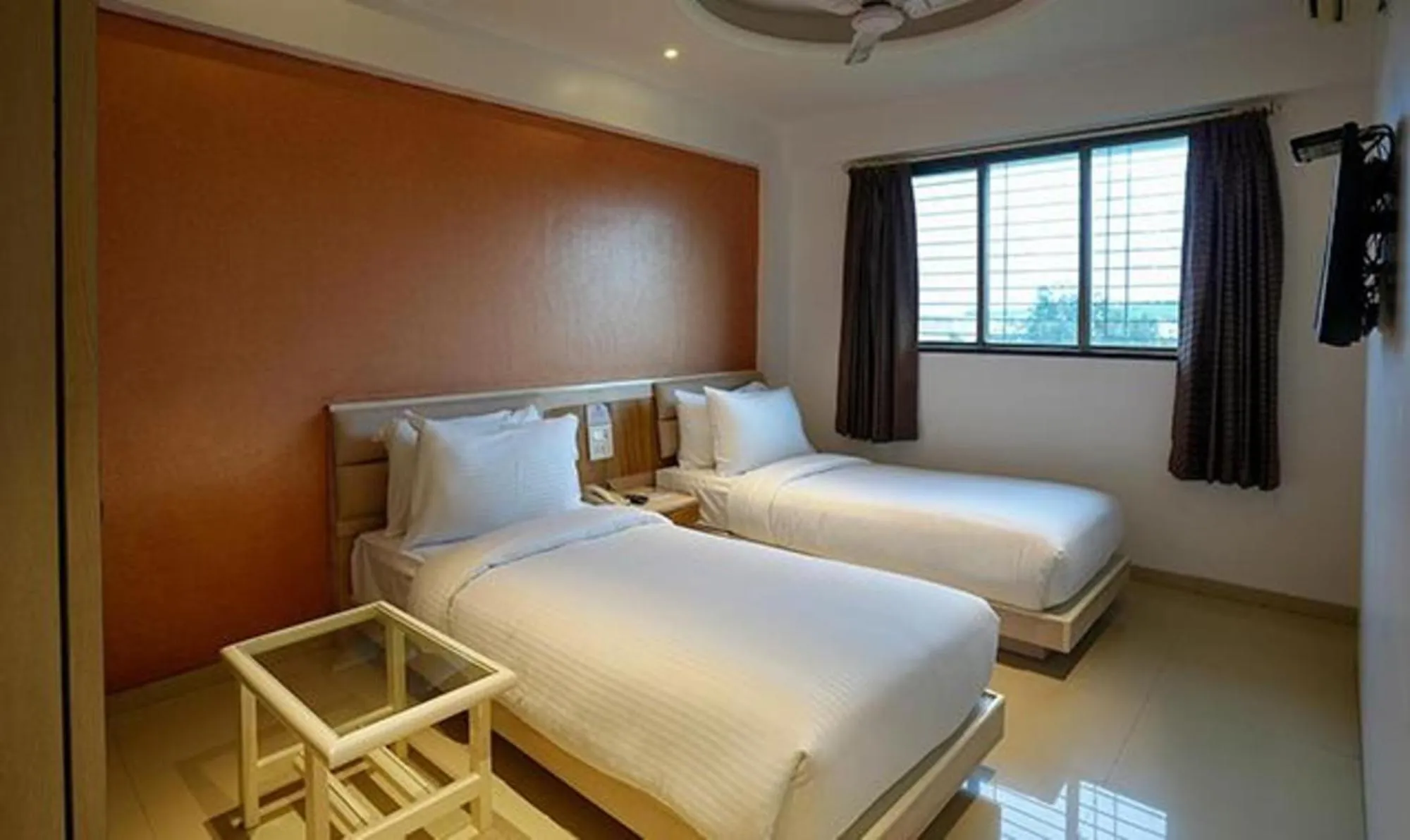 Bed in FabHotel Prime Rester Select Chakan