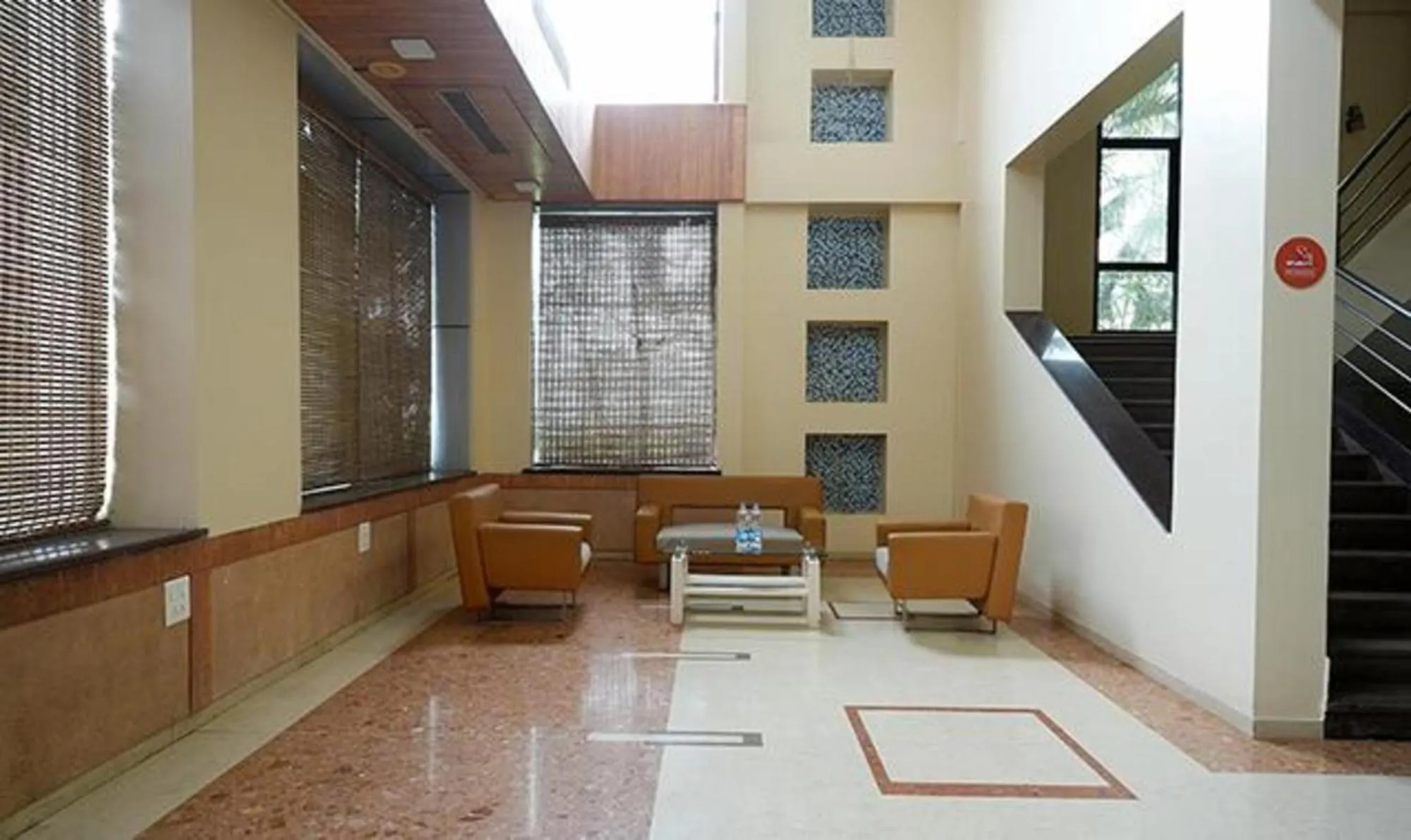 Seating area in FabHotel Prime Rester Select Chakan