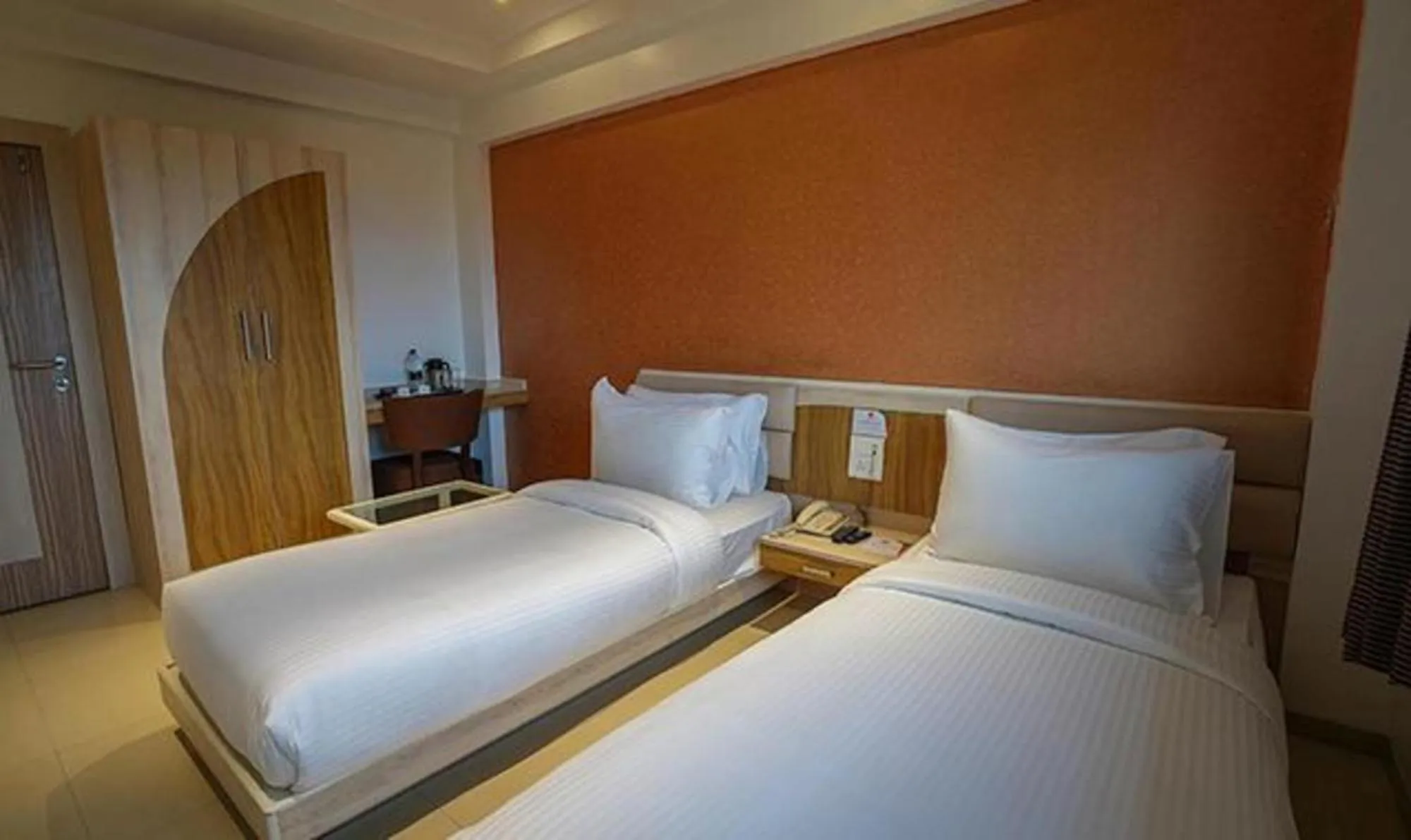 Bed in FabHotel Prime Rester Select Chakan