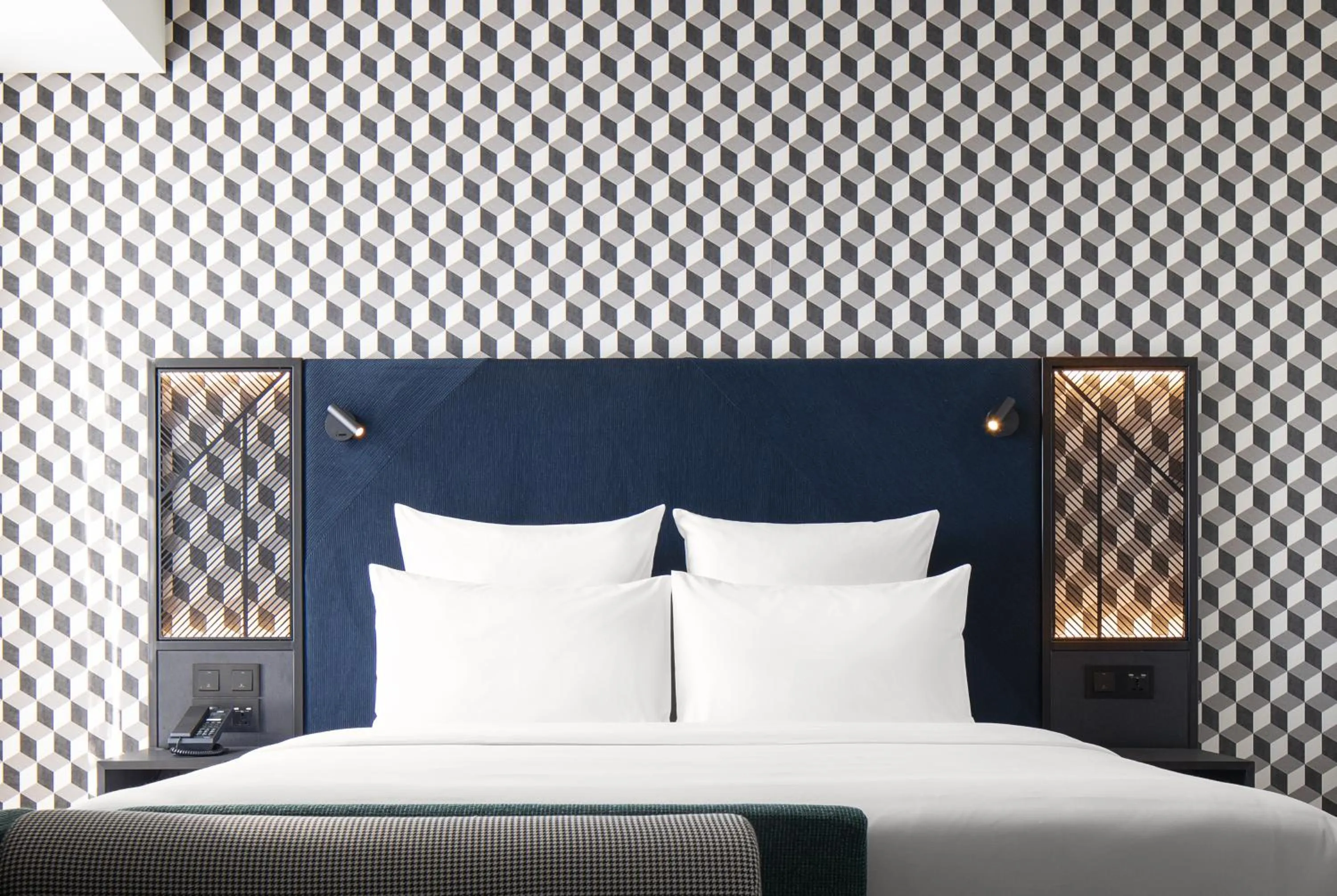 Bed in TRIBE Phnom Penh Post Office