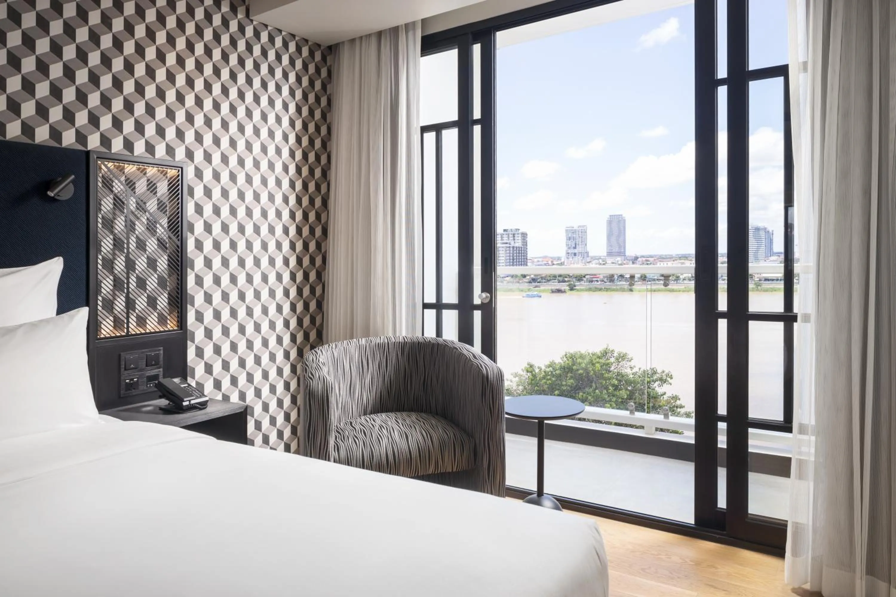 Bed in TRIBE Phnom Penh Post Office