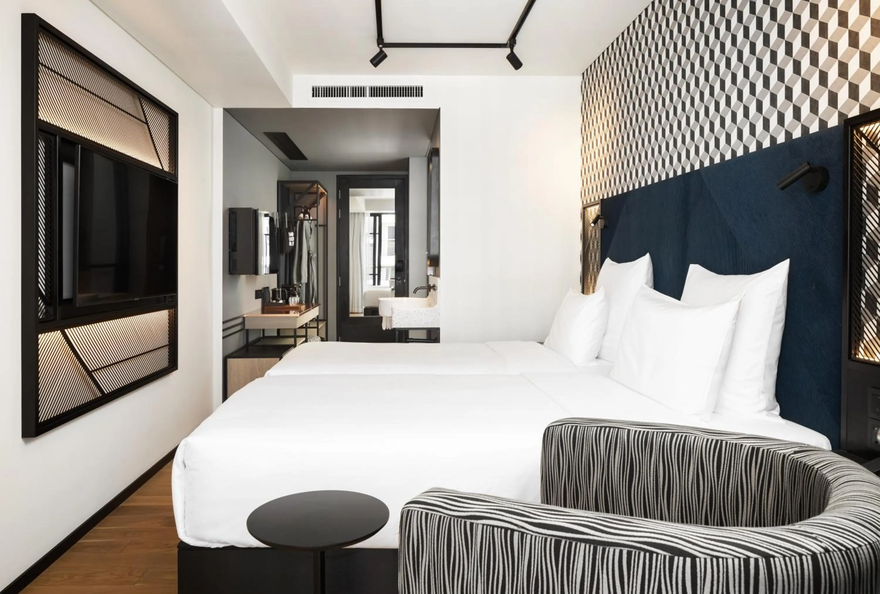 Bed in TRIBE Phnom Penh Post Office