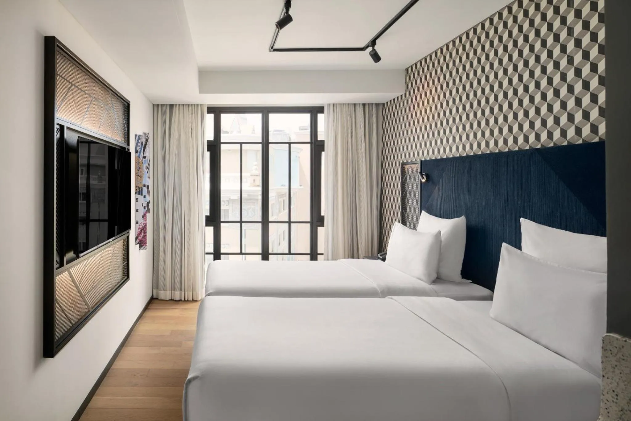 Bed in TRIBE Phnom Penh Post Office