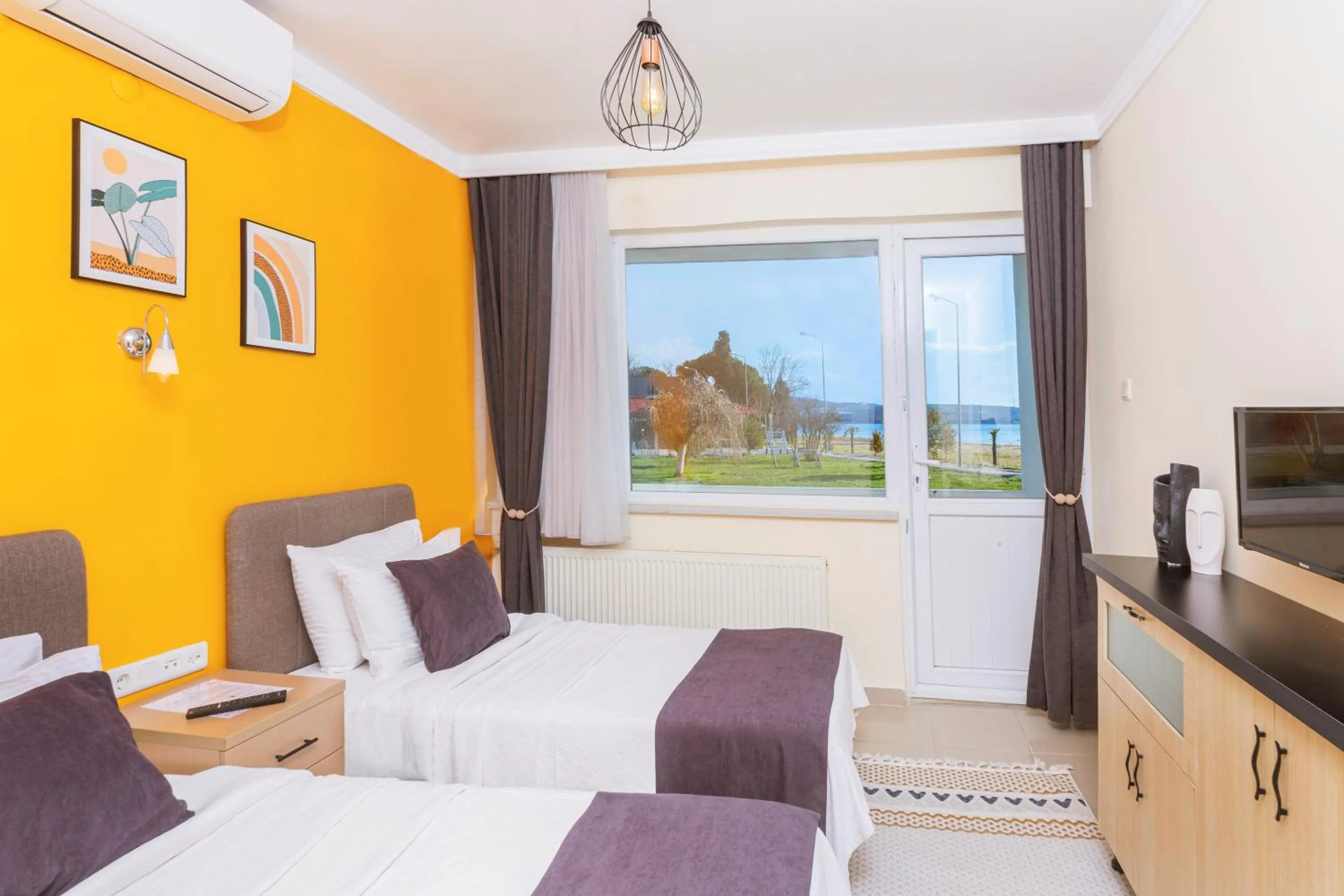 Bed in KİRAZ BEACH OTEL