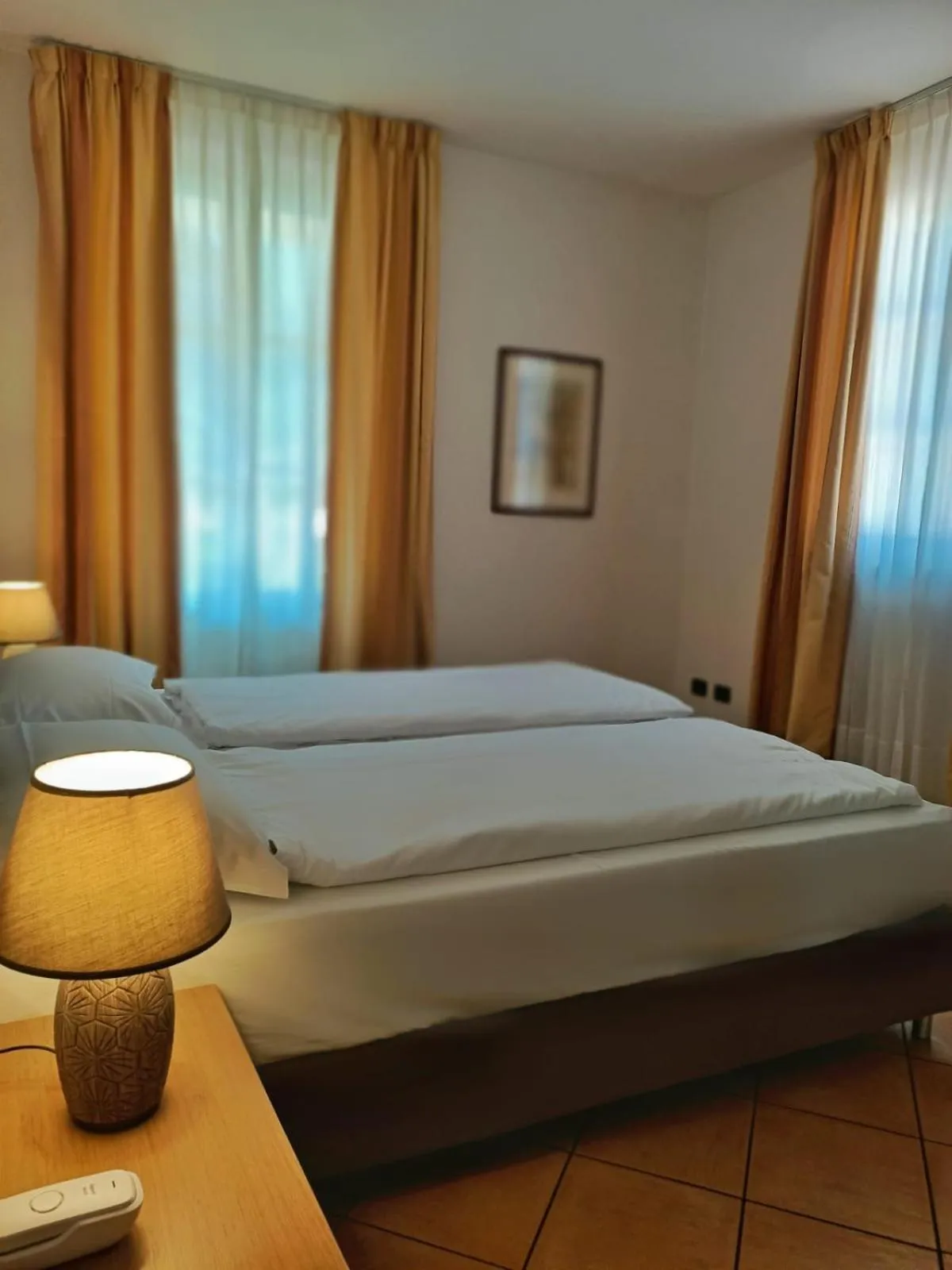 Bed in Aquazzurra Resort & Aparthotel