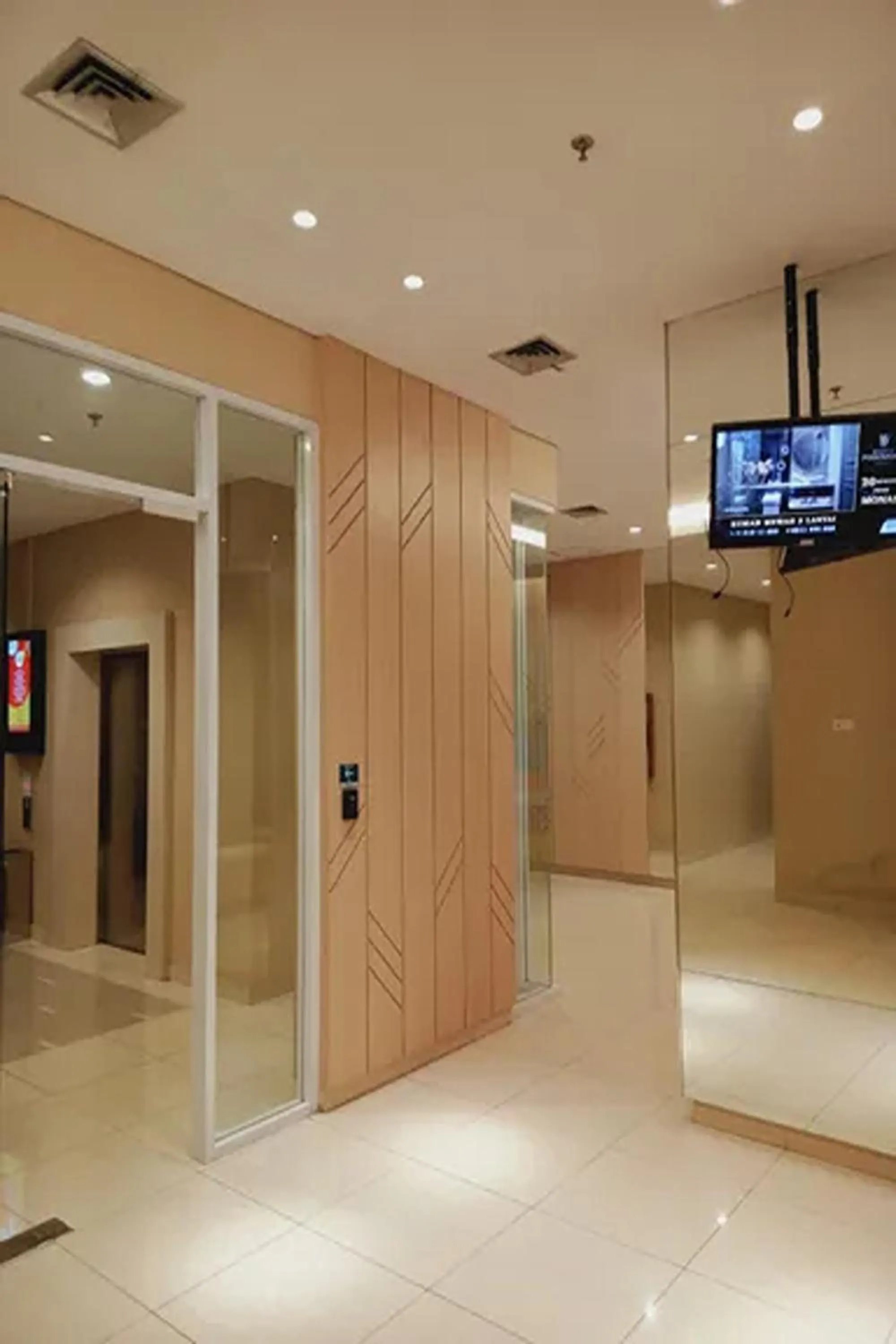 Lobby or reception in Velito at Podomoro Golf View Apartment