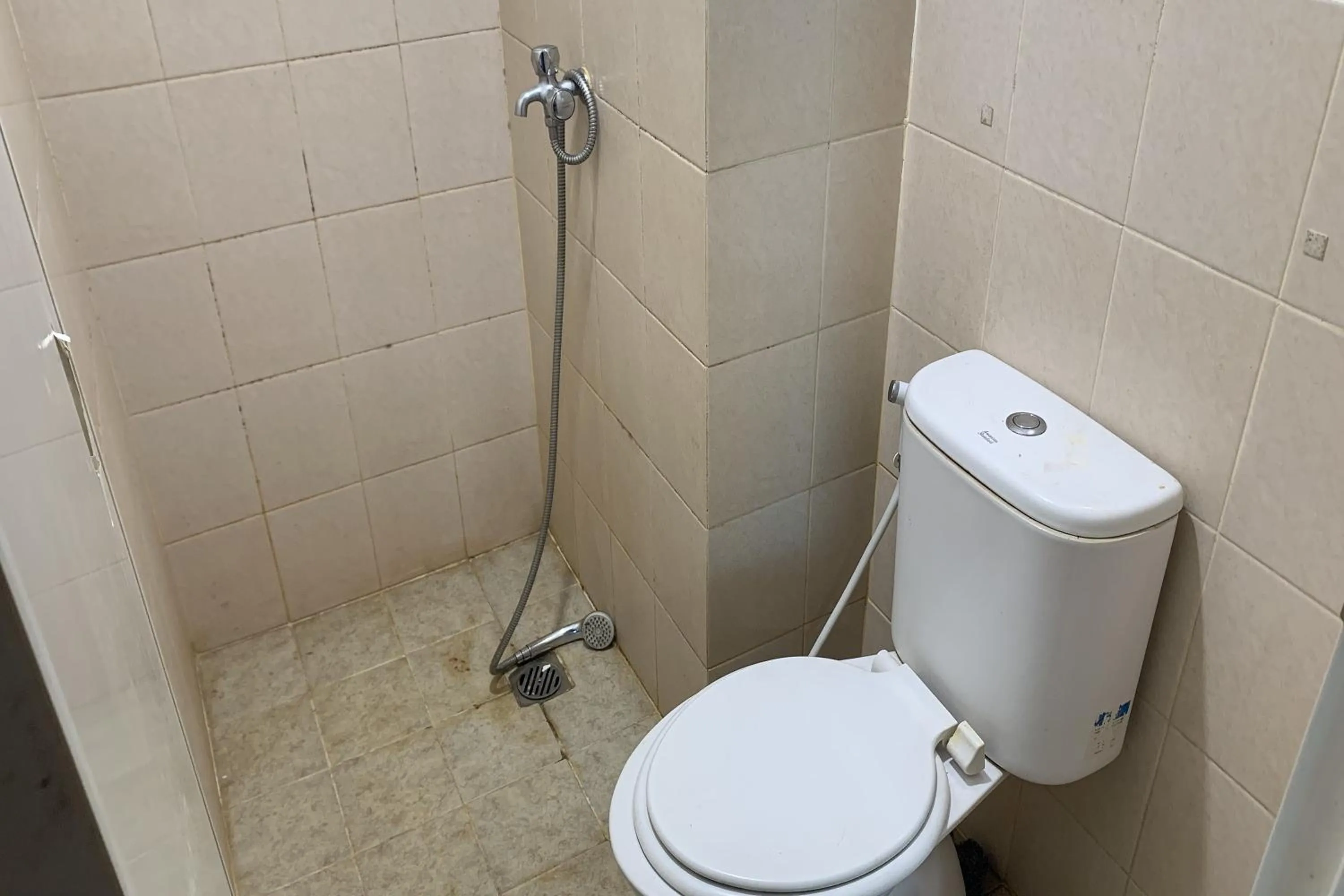 Bathroom in Velito at Podomoro Golf View Apartment