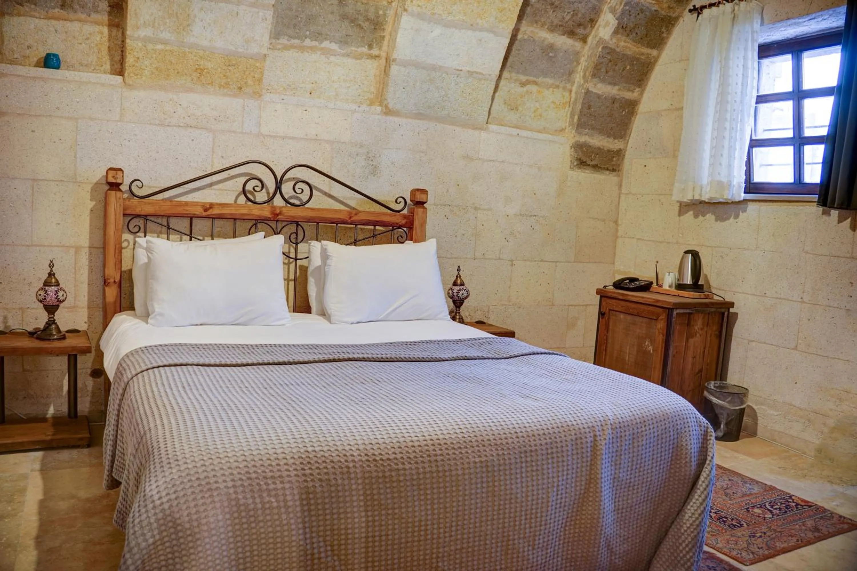 Bed in Karma Cappadocia