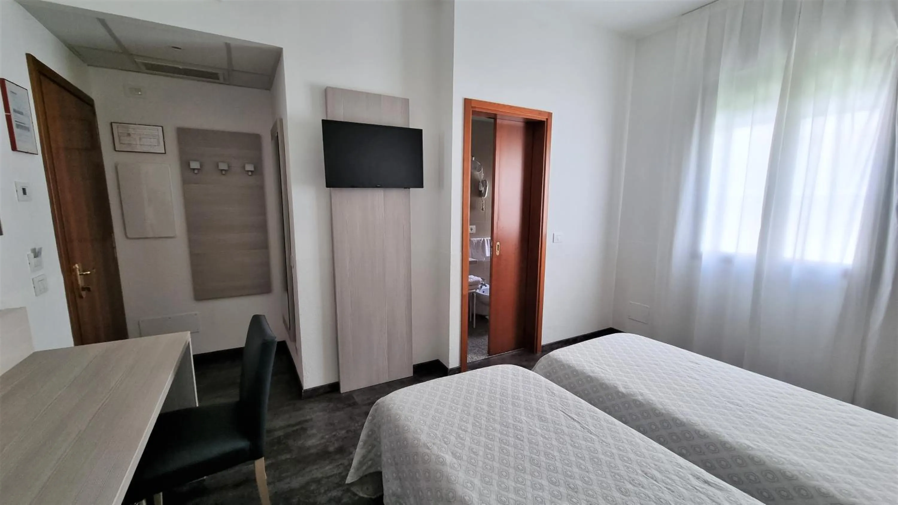 Bed in Alfa Fiera Hotel