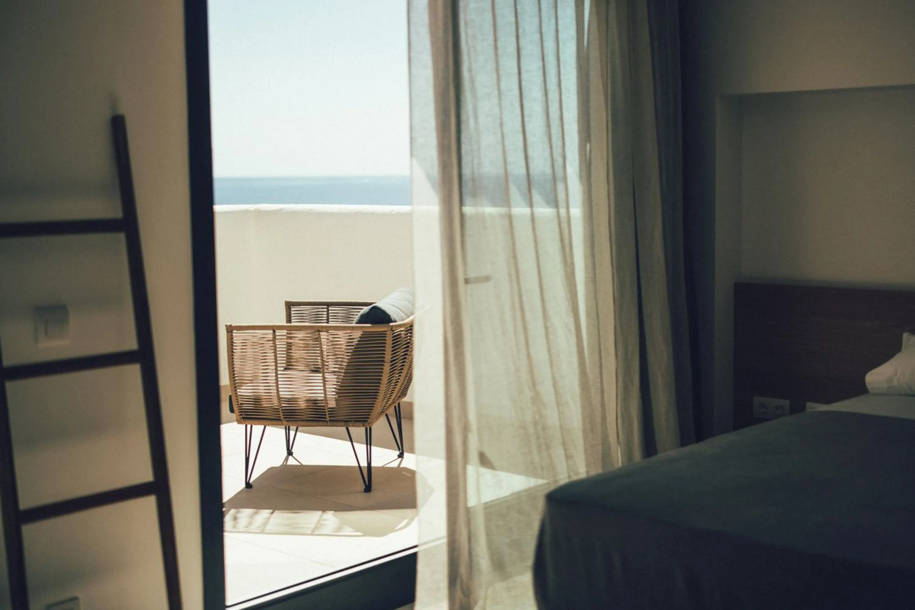 Bed in Cala Lanuza Suites