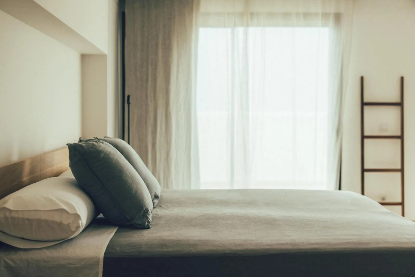 Bed in Cala Lanuza Suites