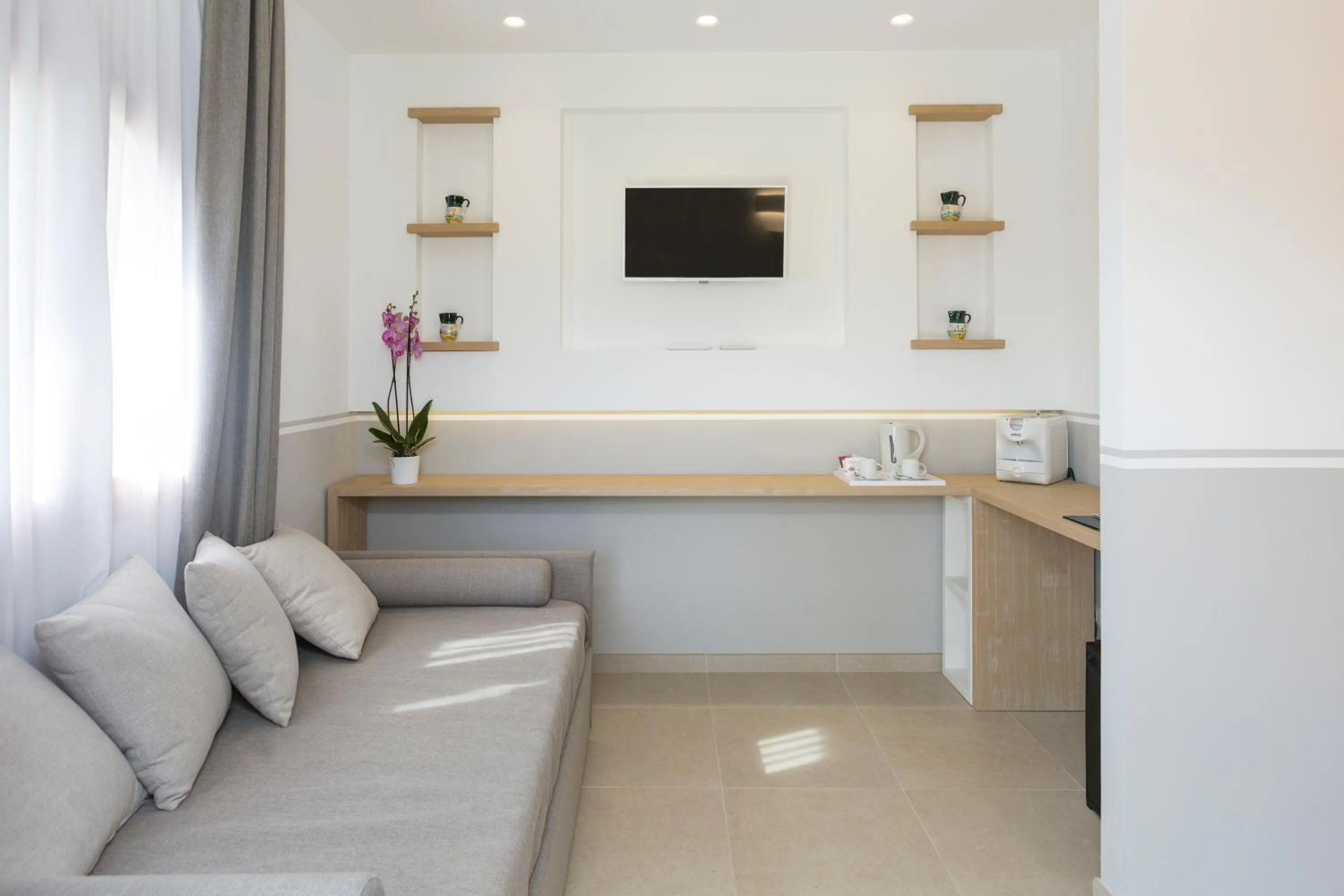 Living room in Giardino Dei Pini - Boutique Hotel