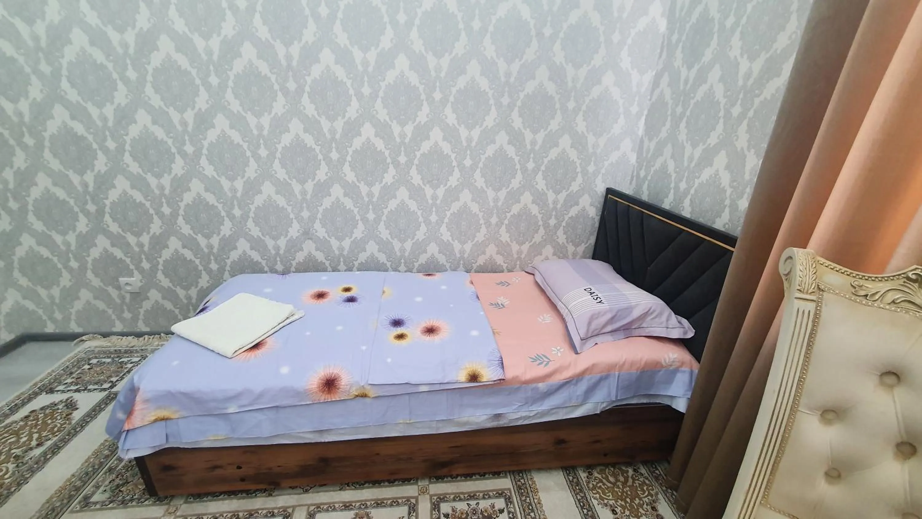 Bed in Fayzli GuestHouse