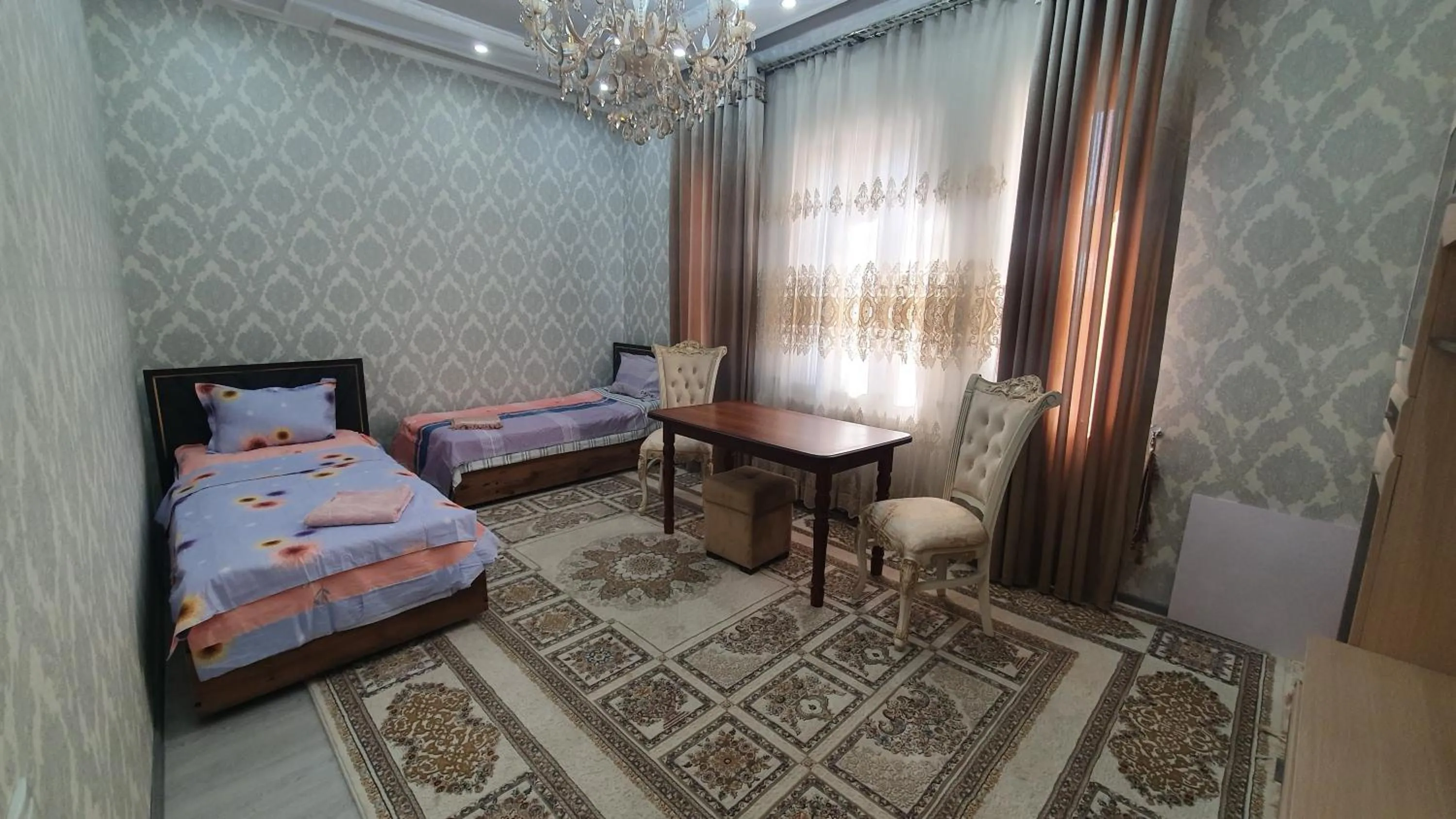 Bed in Fayzli GuestHouse