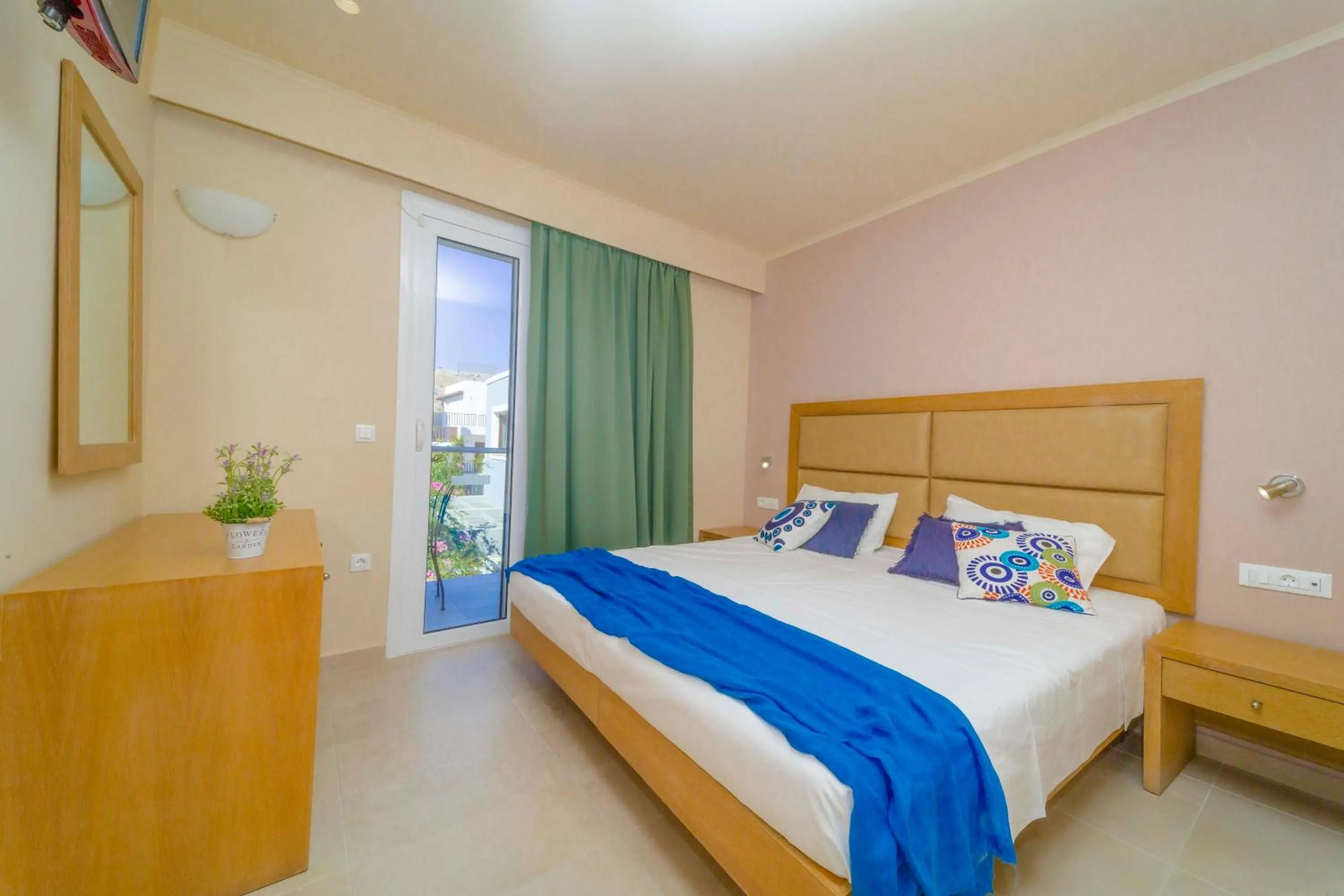 Bed in Amaryllis front beach hotel