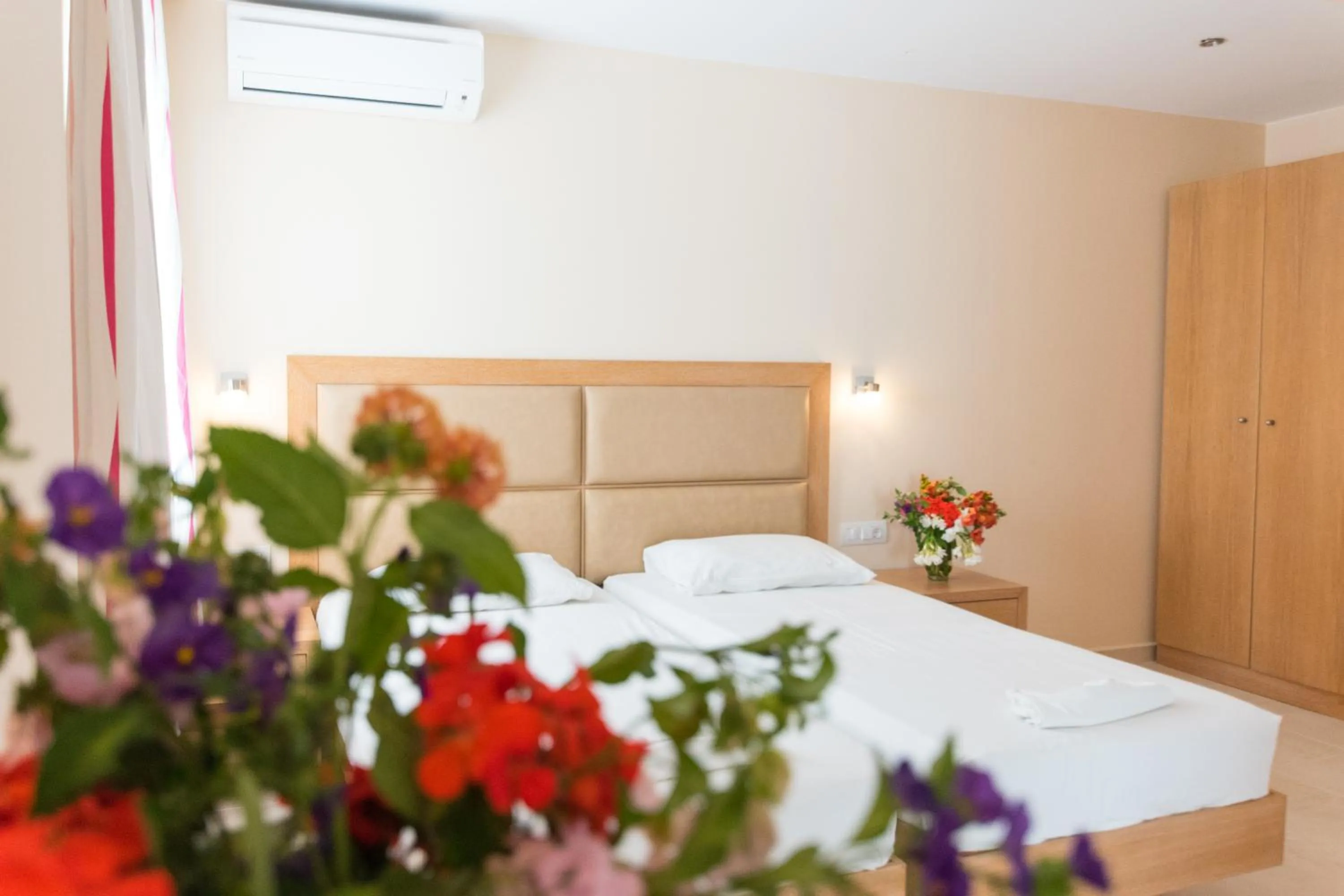 Bed in Amaryllis front beach hotel