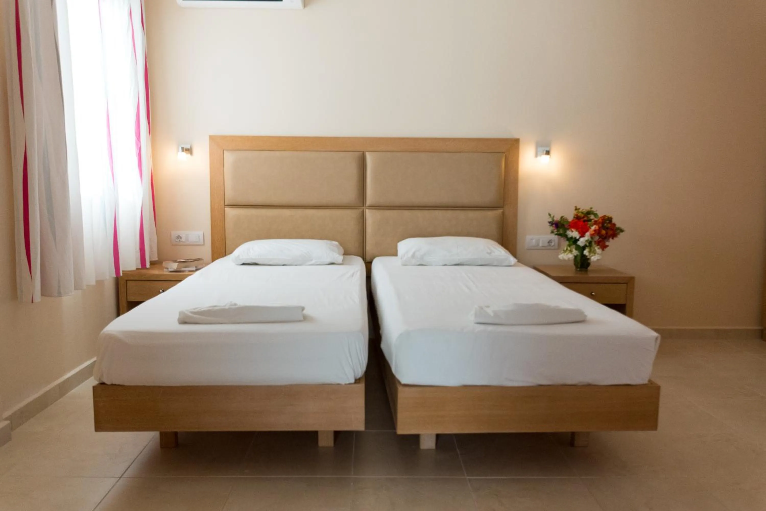 Bed in Amaryllis front beach hotel