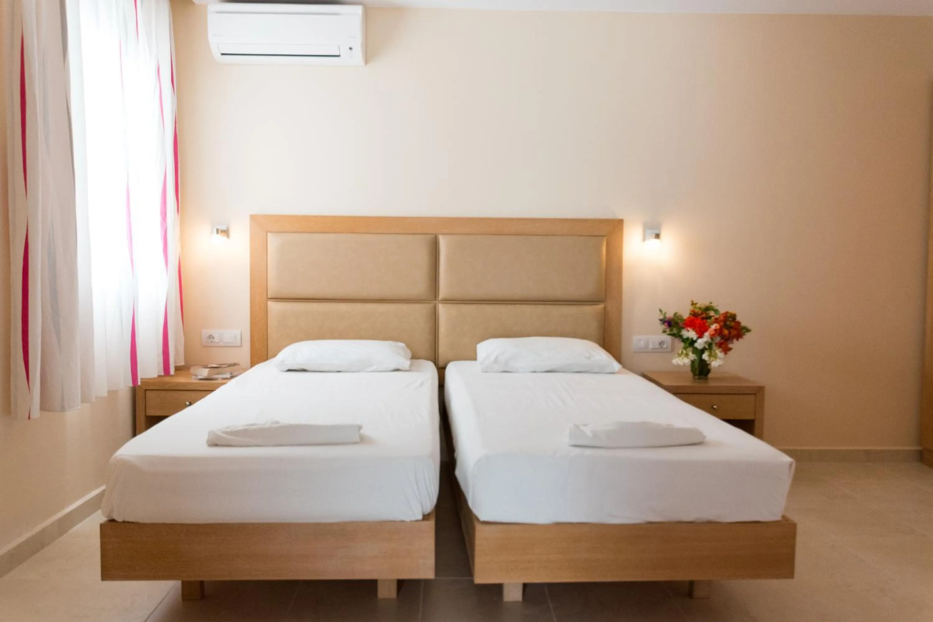 Bed in Amaryllis front beach hotel