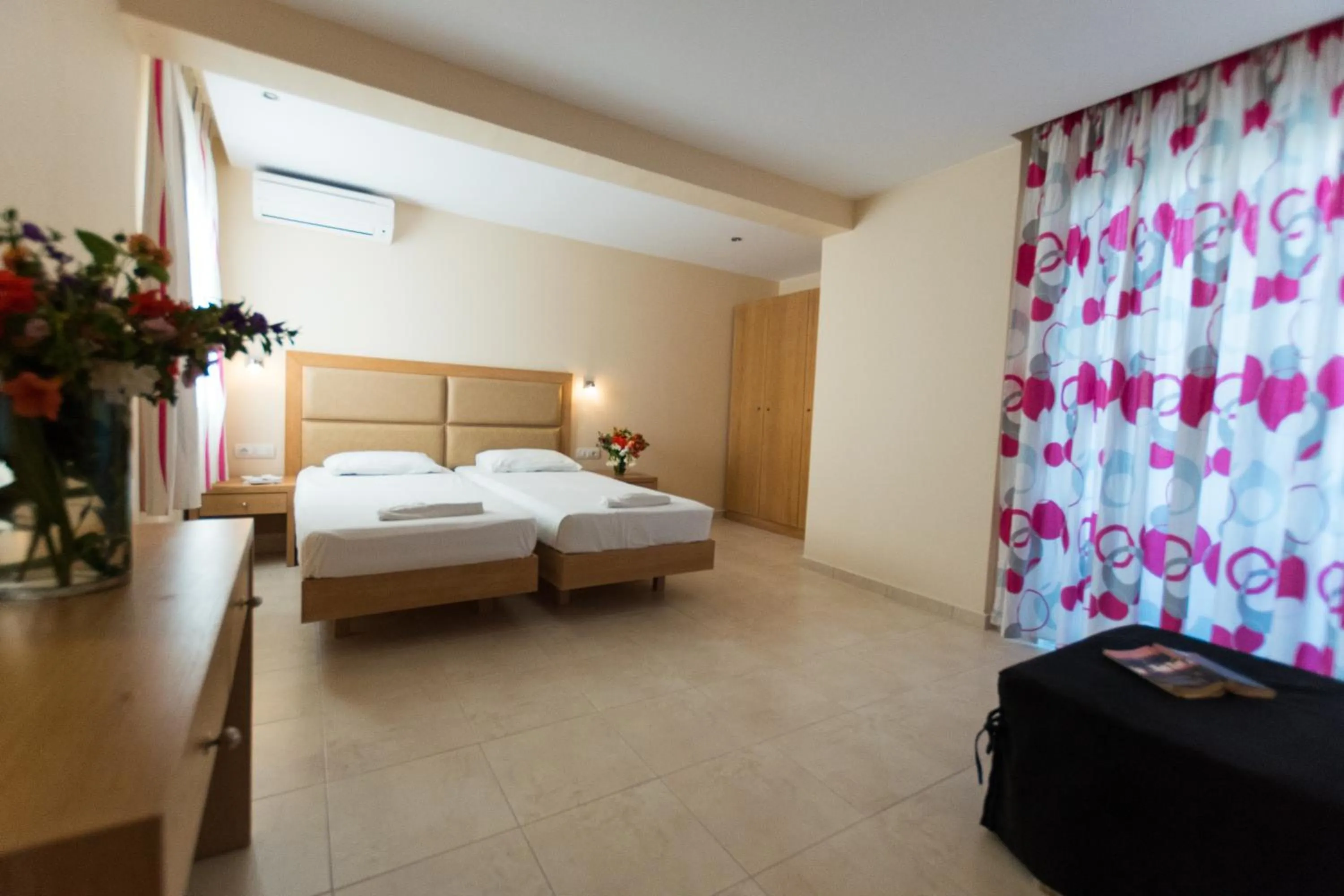 Photo of the whole room, Bed in Amaryllis front beach hotel