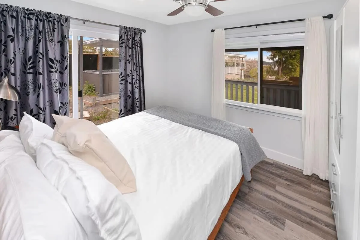 Bed in Dragonfly Cottage by EMR Vacation Rentals