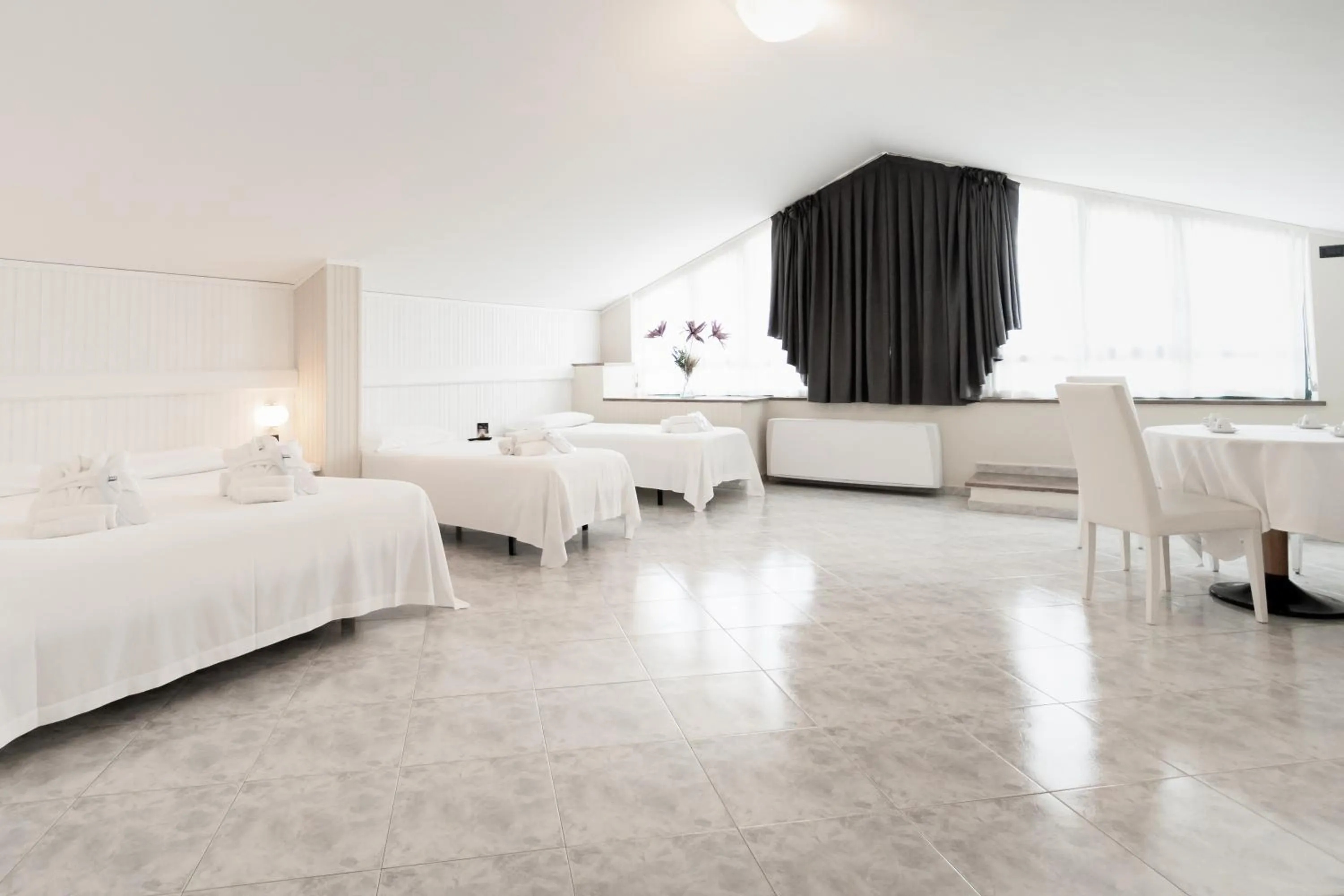 Living room, Bed in Rivoli Hotel