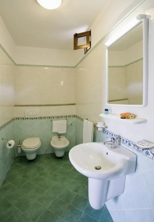Toilet in Albergo Villa Hibiscus