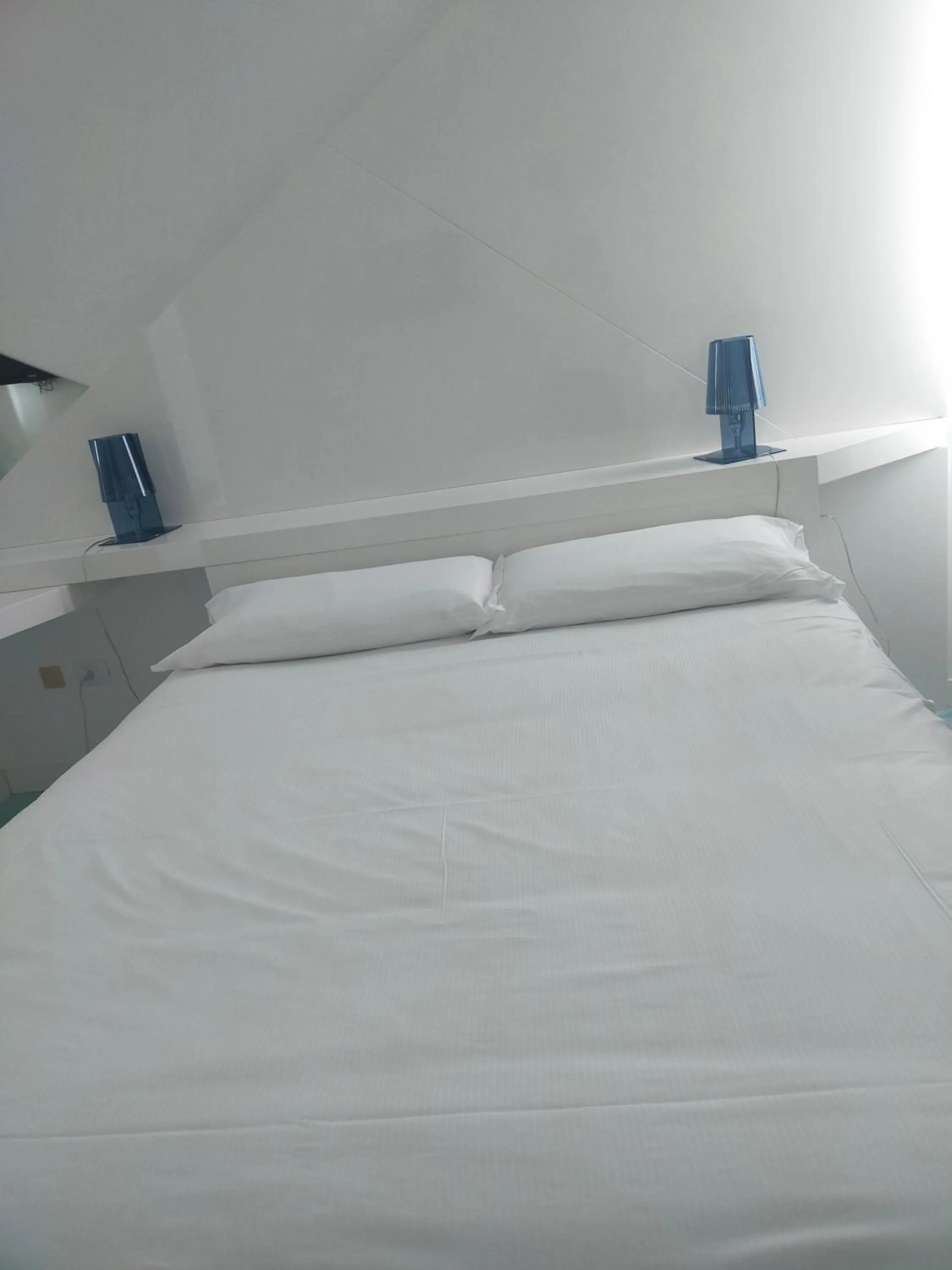 Bed in Hotel Excelsior