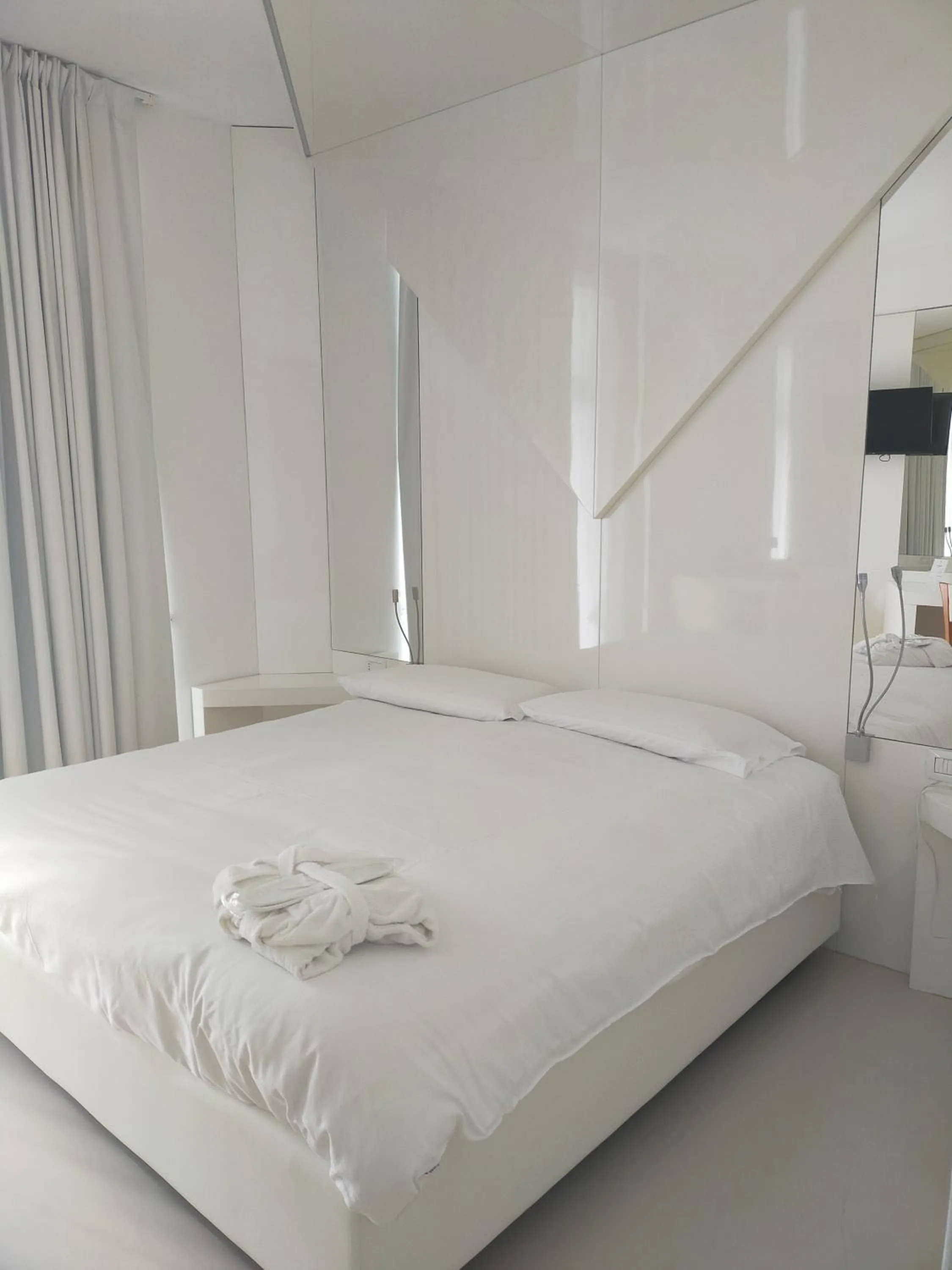 Bed in Hotel Excelsior