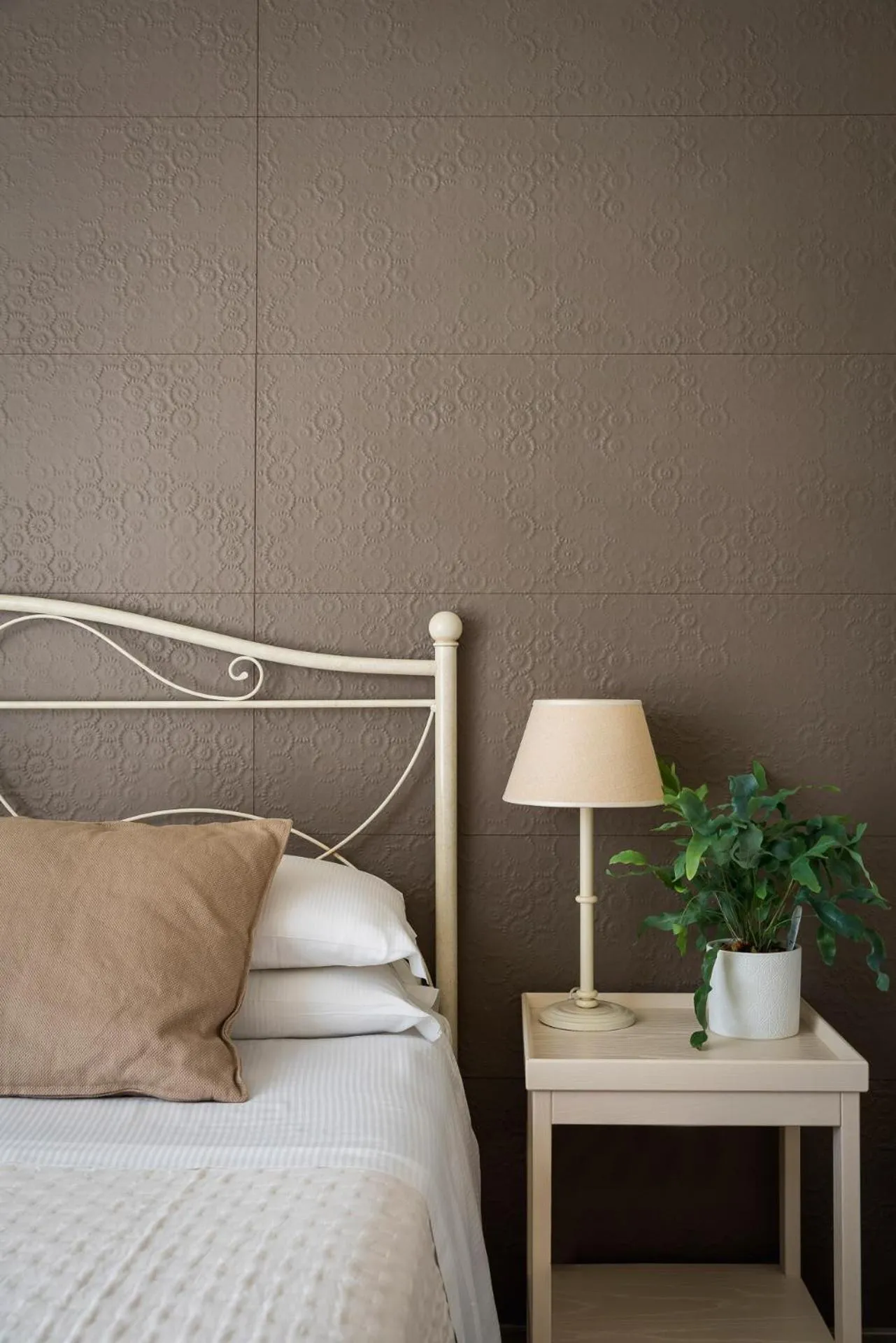 Bed in Hotel Giardino Suites&Spa