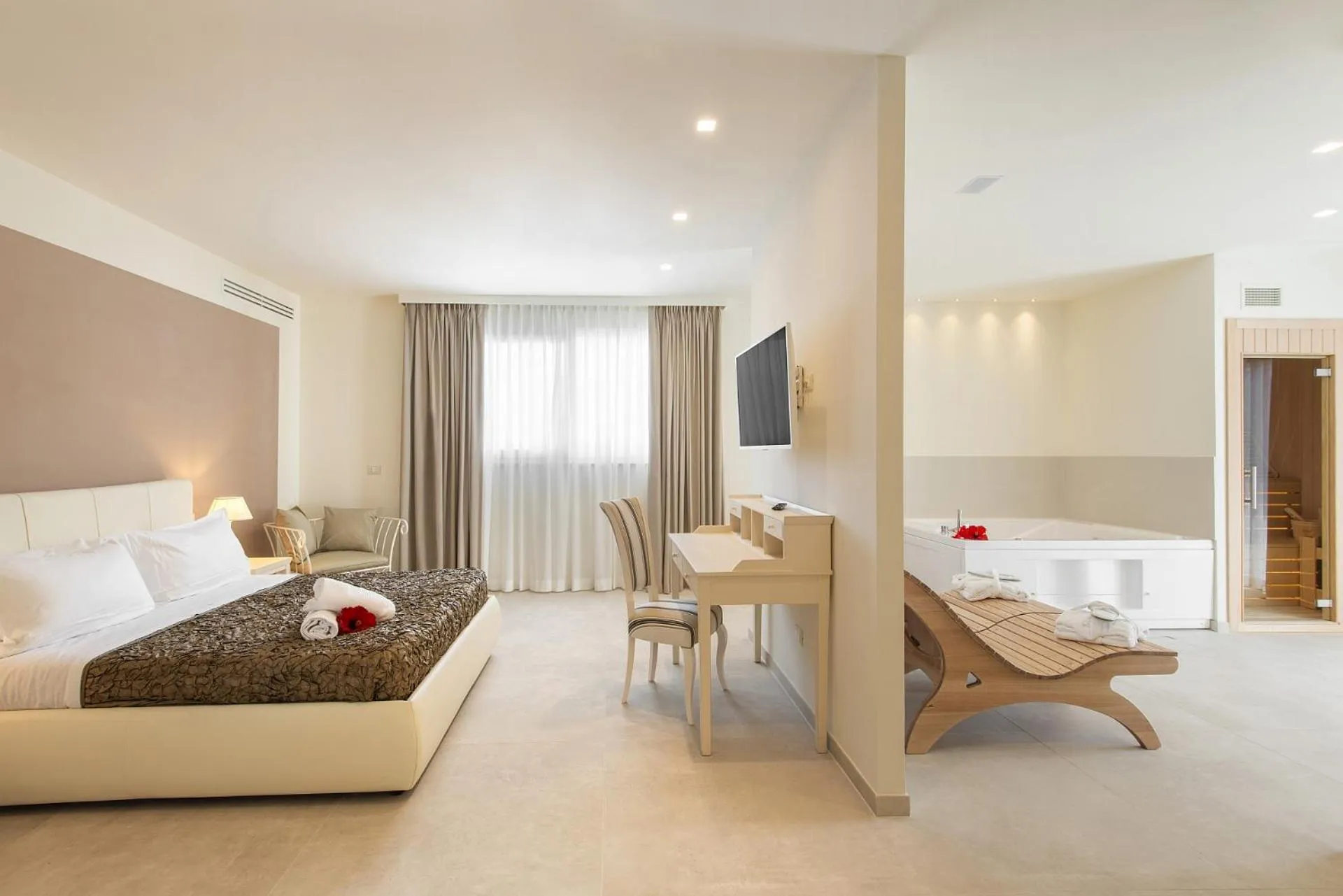 Bed in Hotel Giardino Suites&Spa