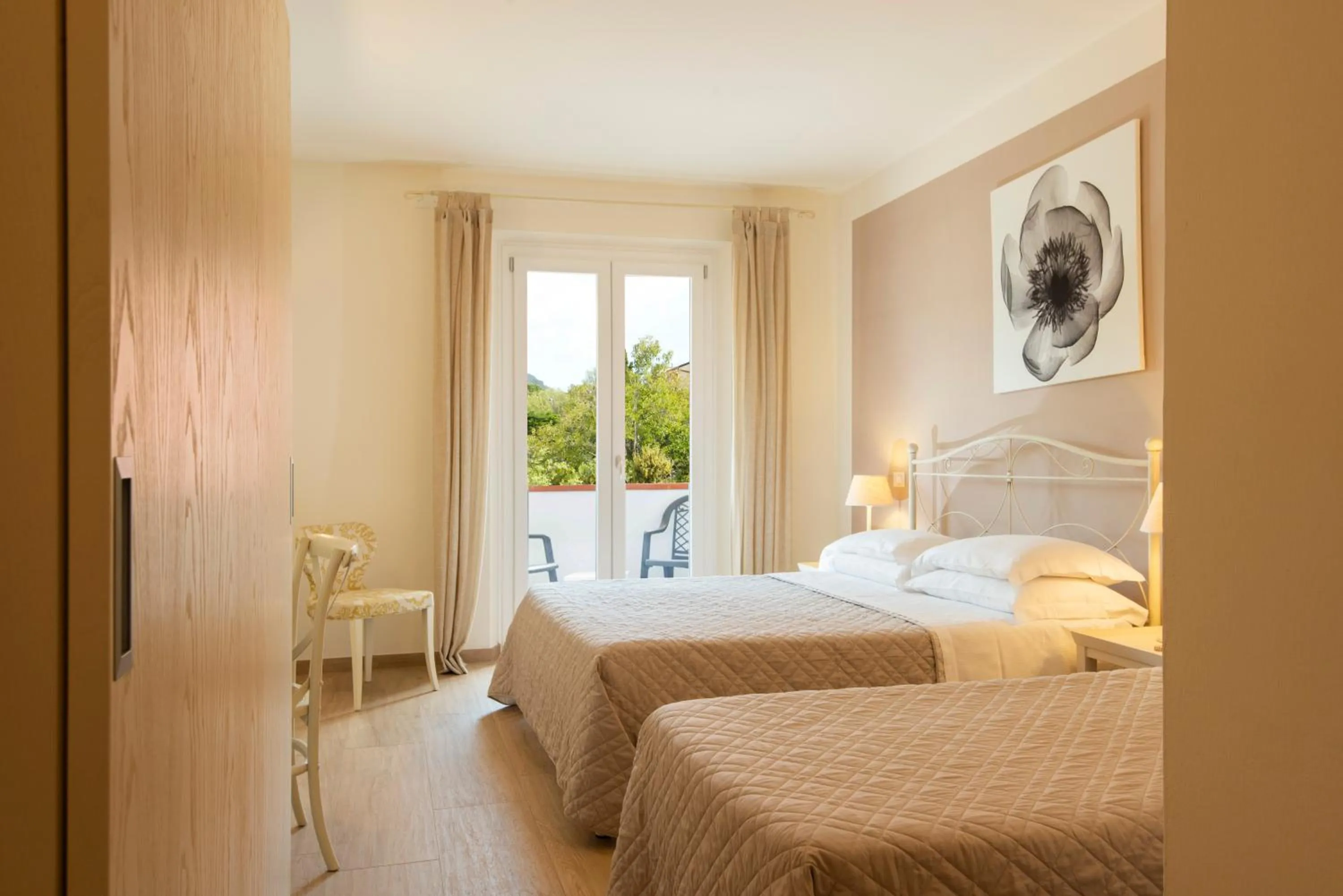 Bed in Hotel Giardino Suites&Spa