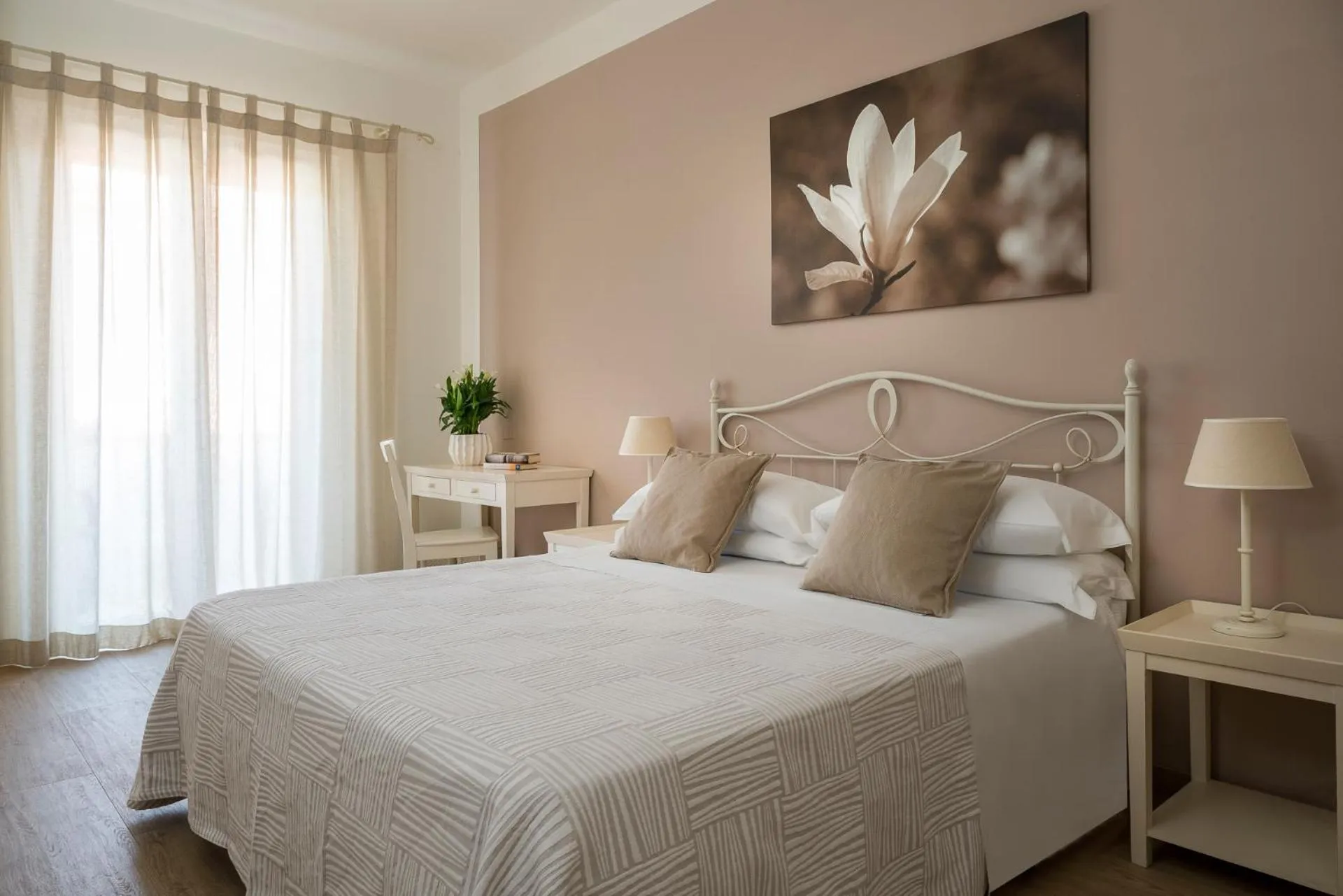 Bed in Hotel Giardino Suites&Spa