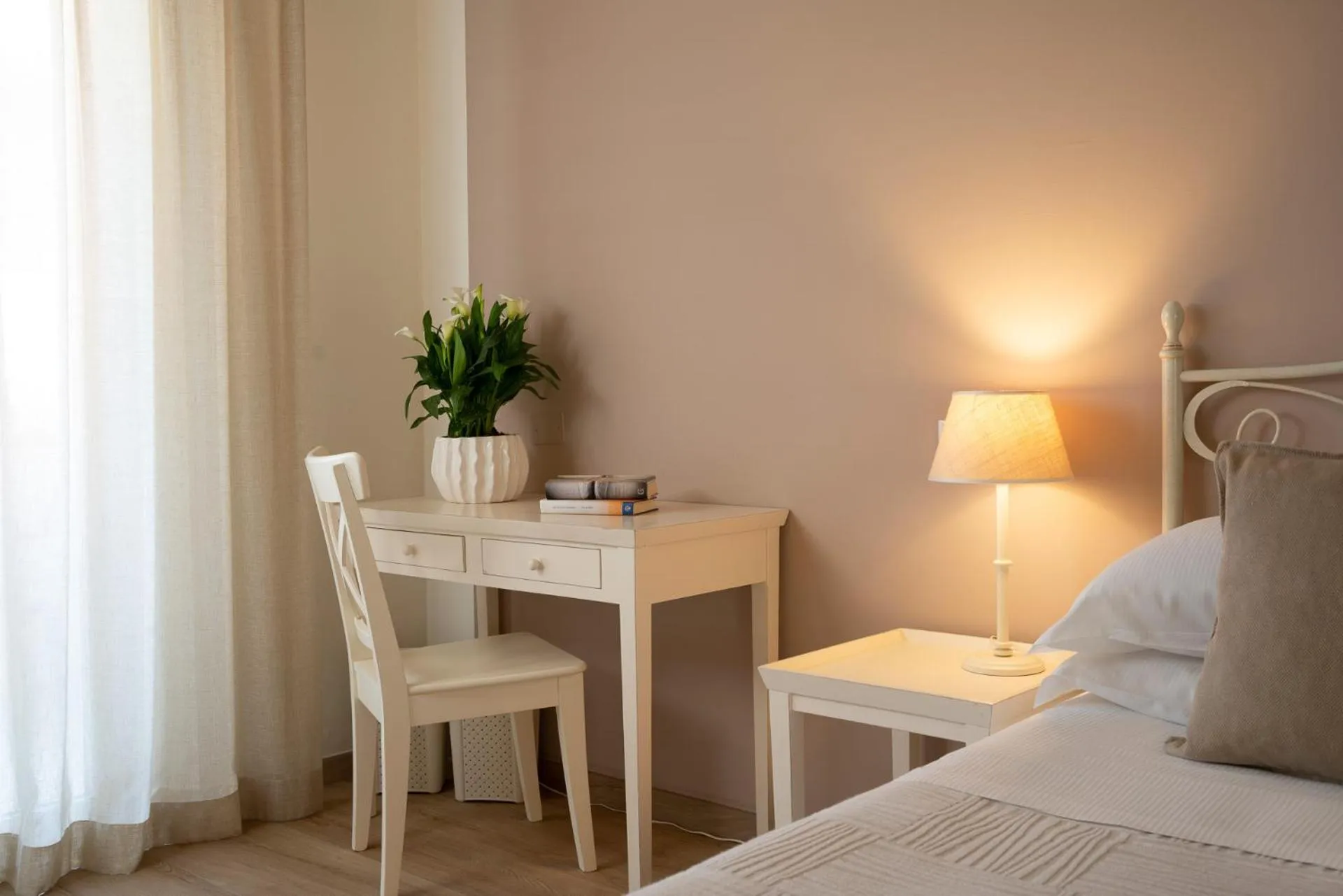 Bed in Hotel Giardino Suites&Spa